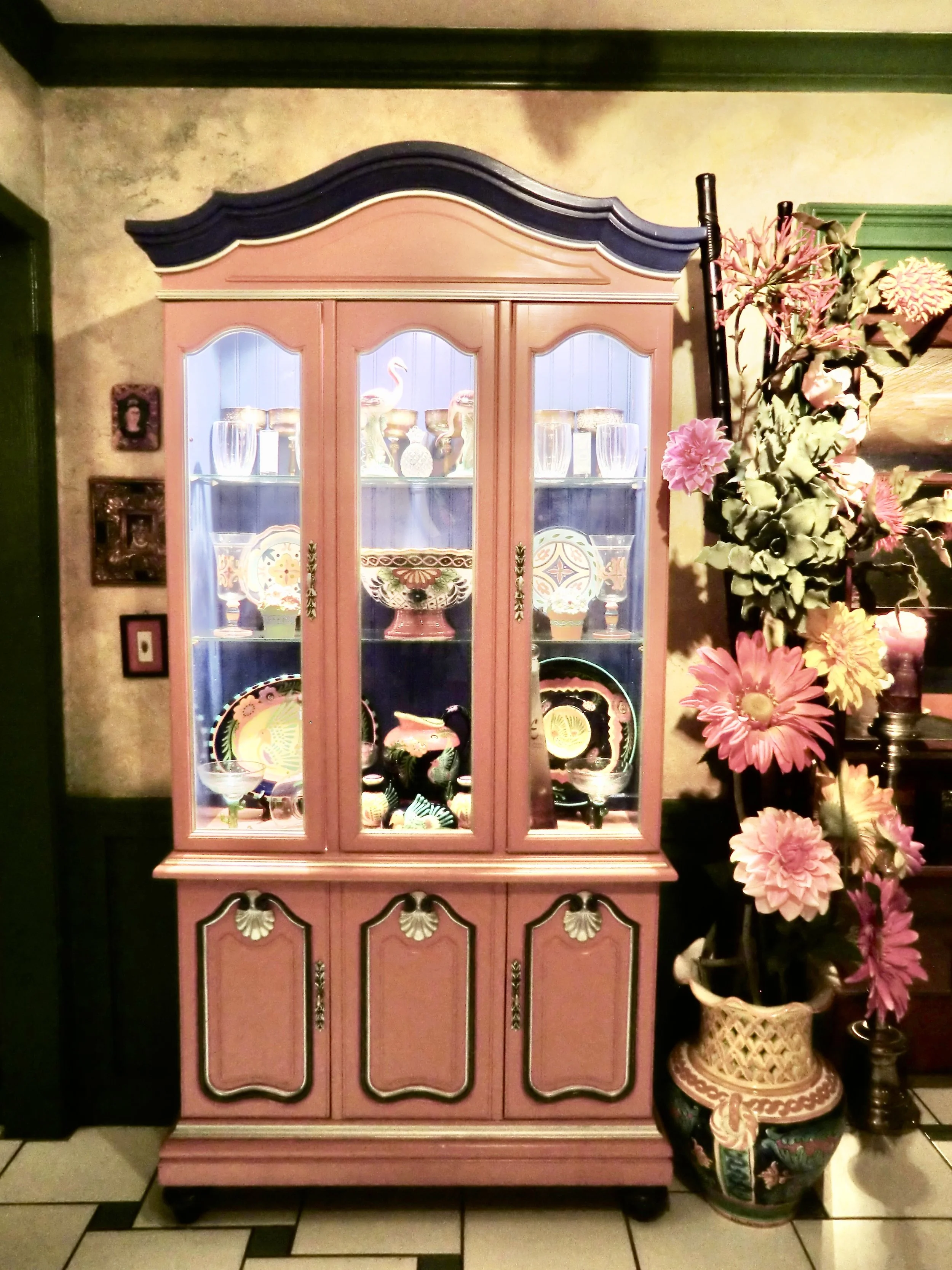 Coastal Mediterranean style china hutch painted coral and blue in Fort Lauderdale