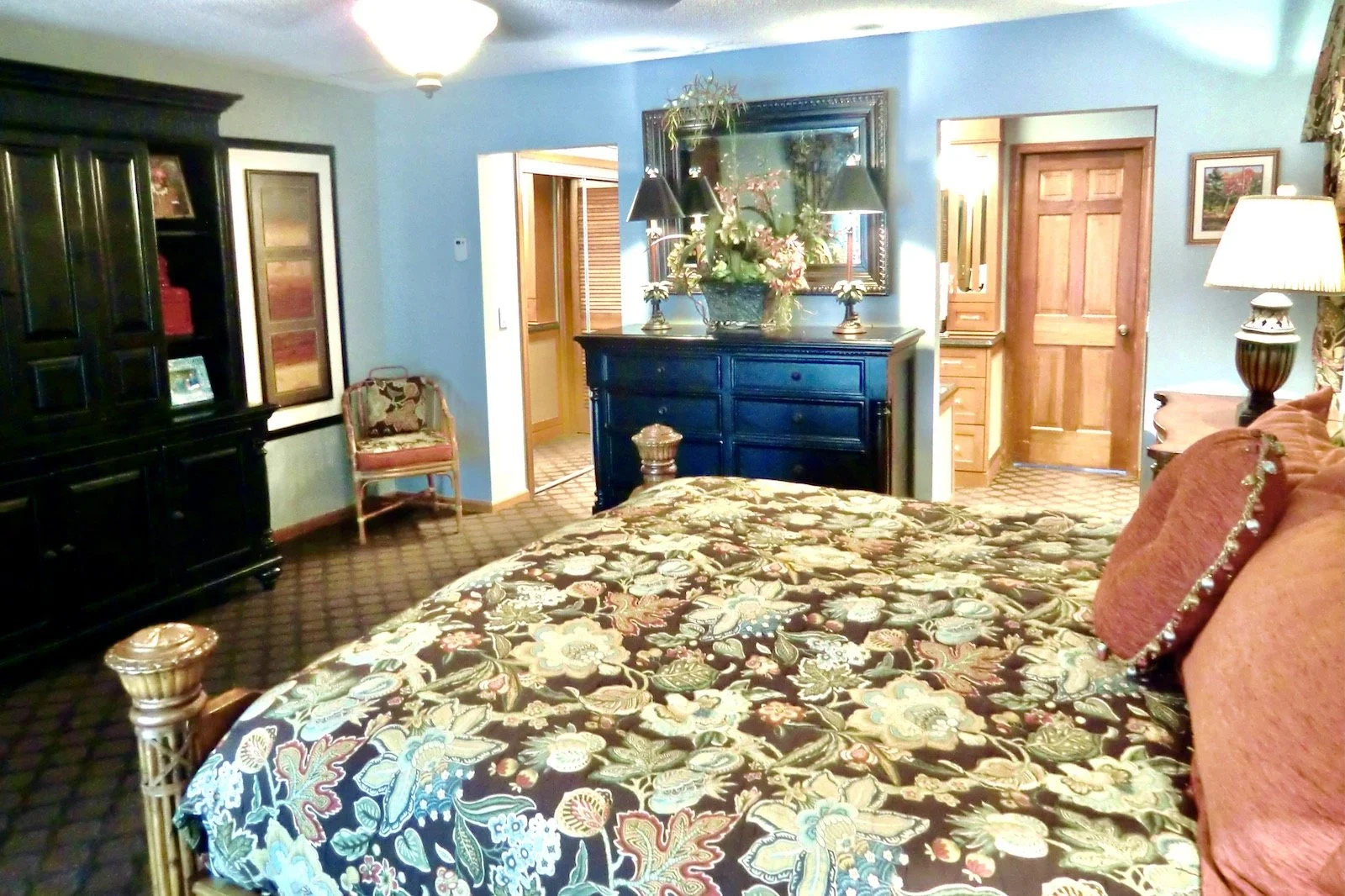 primary bedroom with black Tommy Bahama furniture in Delray Beach