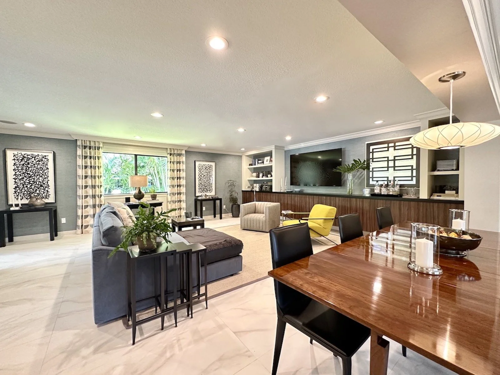 modern great room with mid century custom wall unit and furnishings in Fort Lauderdale