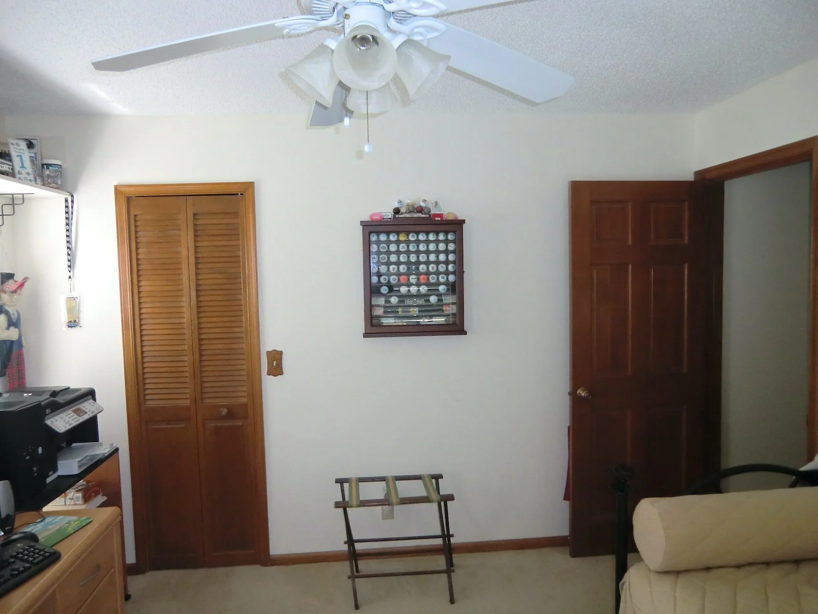 home office before remodel featuring sports memorabilia