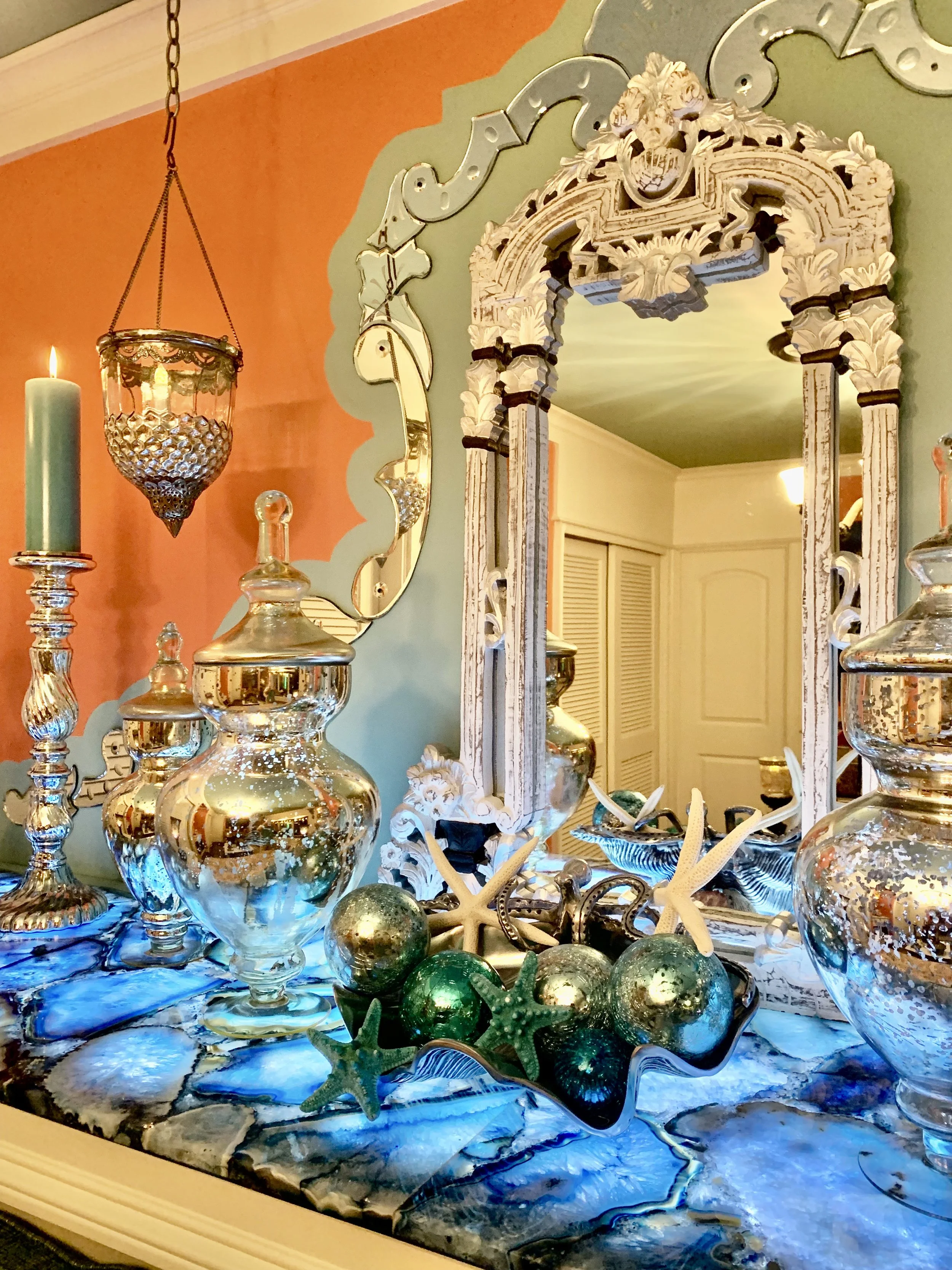 Colorful Mediterranean media room with day bed, Venetian mirror and blue agate in Fort Lauderdale