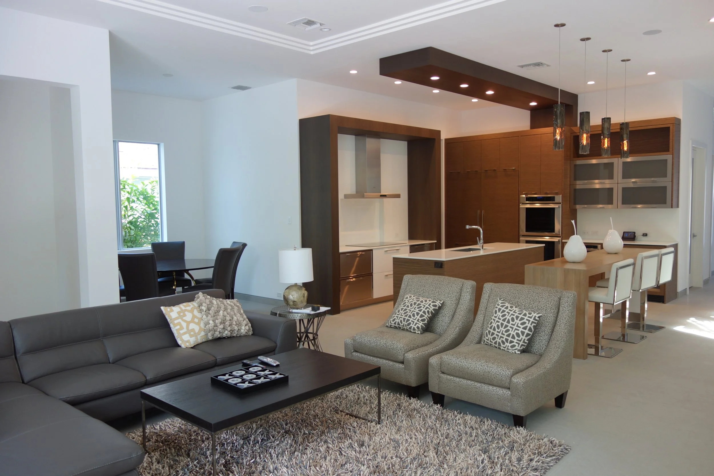 modern kitchen and family room before design build architect in Fort Lauderdale