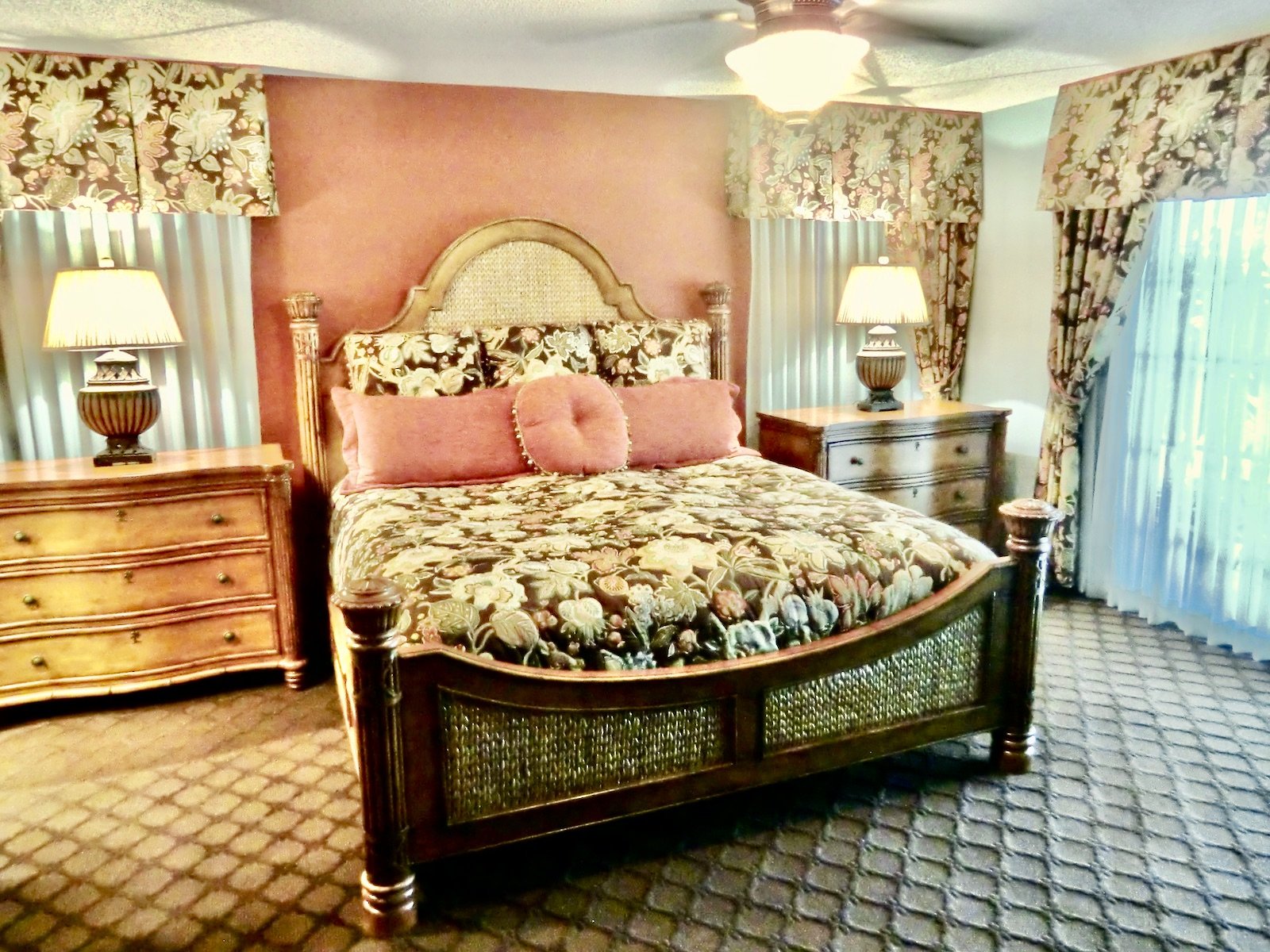 Coastal bedroom with Tommy Bahamas furniture and tropical bedding in Delray Beach