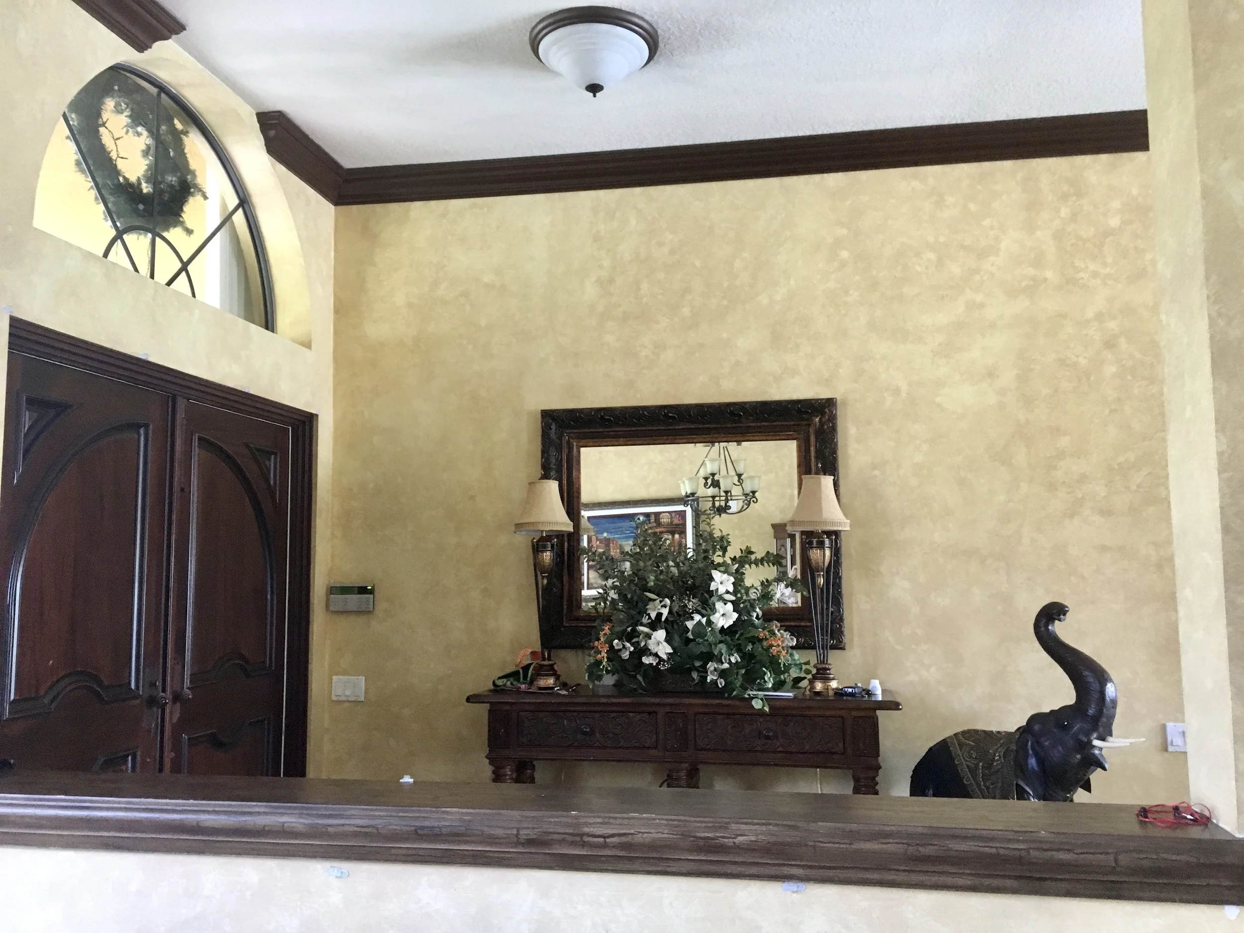 before and after of design build of the foyer in Boca Raton
