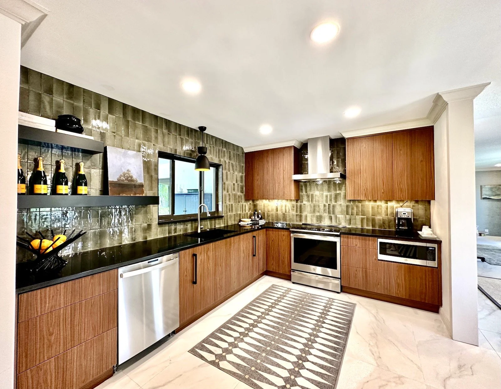 luxury modern mid century kitchen with custom white oak cabinets and open shelves