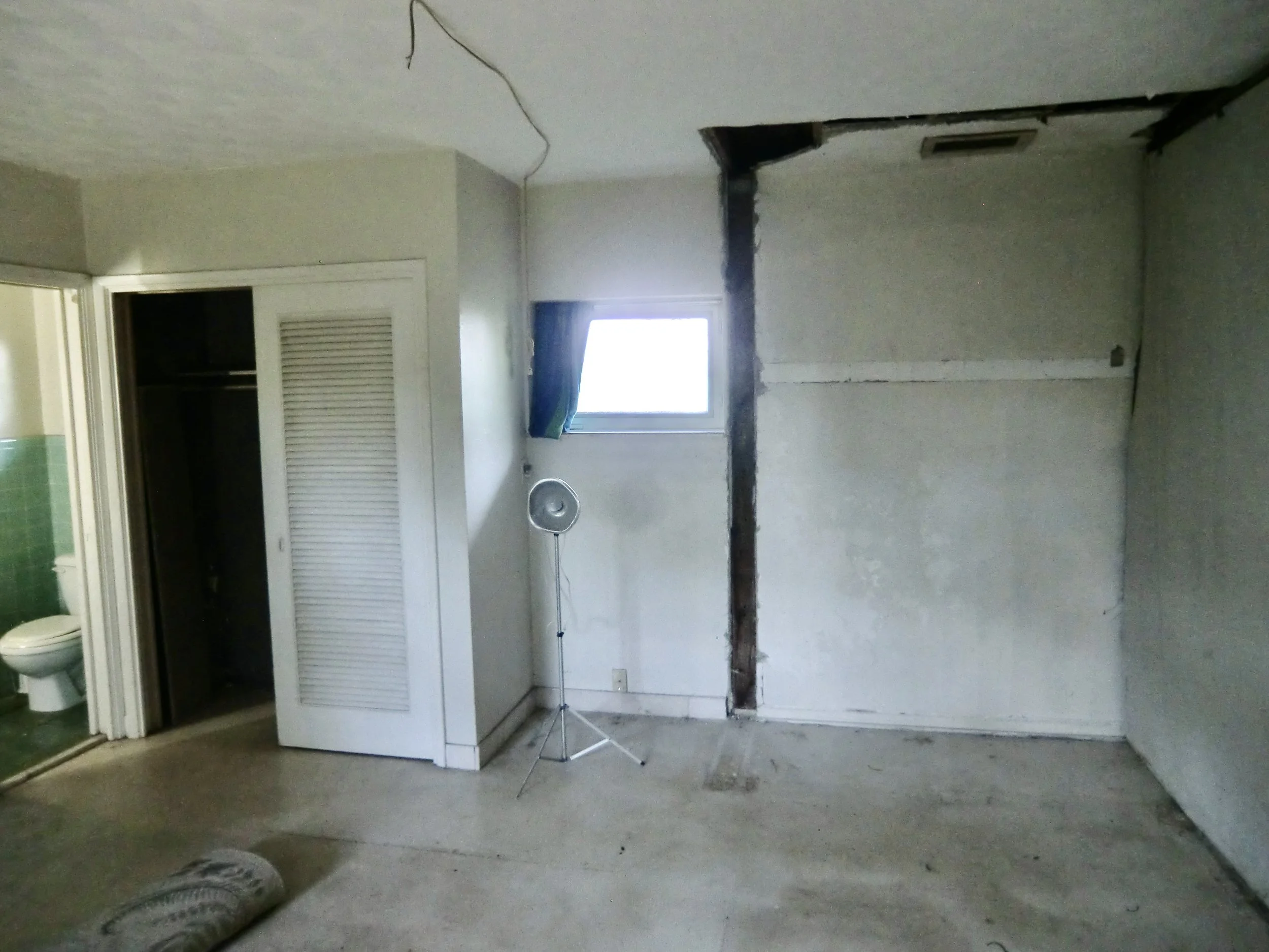 Mediterranean media room before design build remodel in Fort Lauderdale