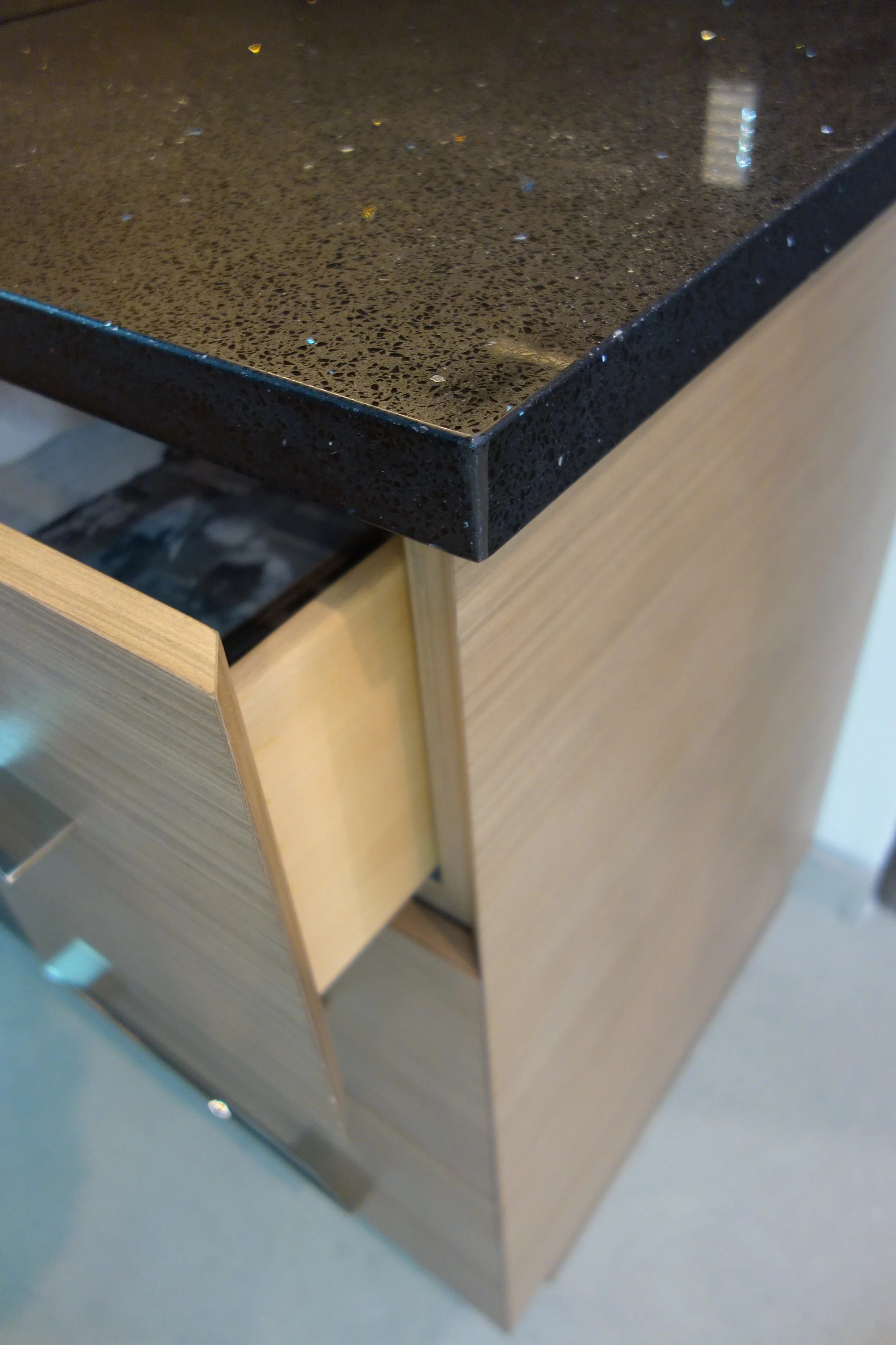 Modern kitchen remodel with custom cabinets having mitered drawers in Las Olas