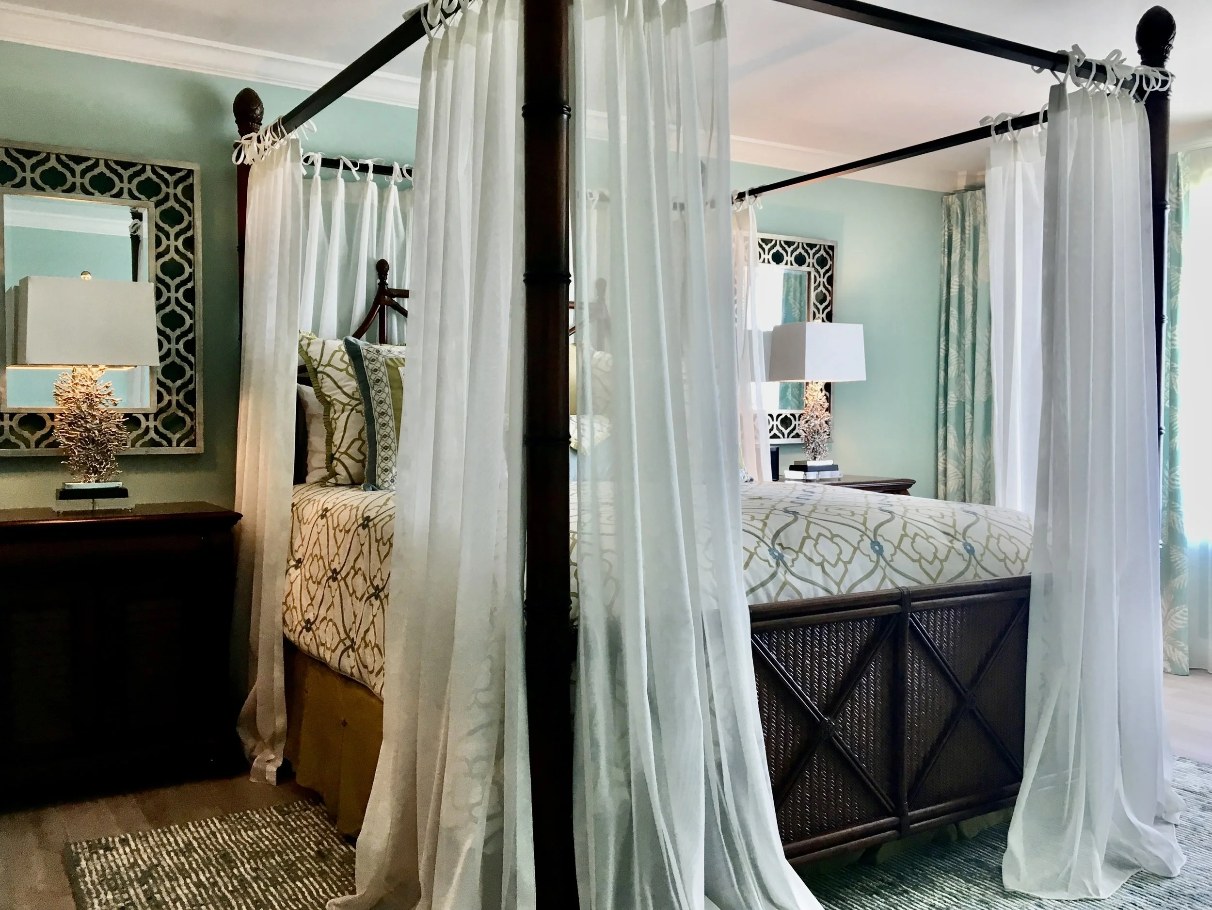 British Colonial Bahama's style bedroom with four poster bed and drapes