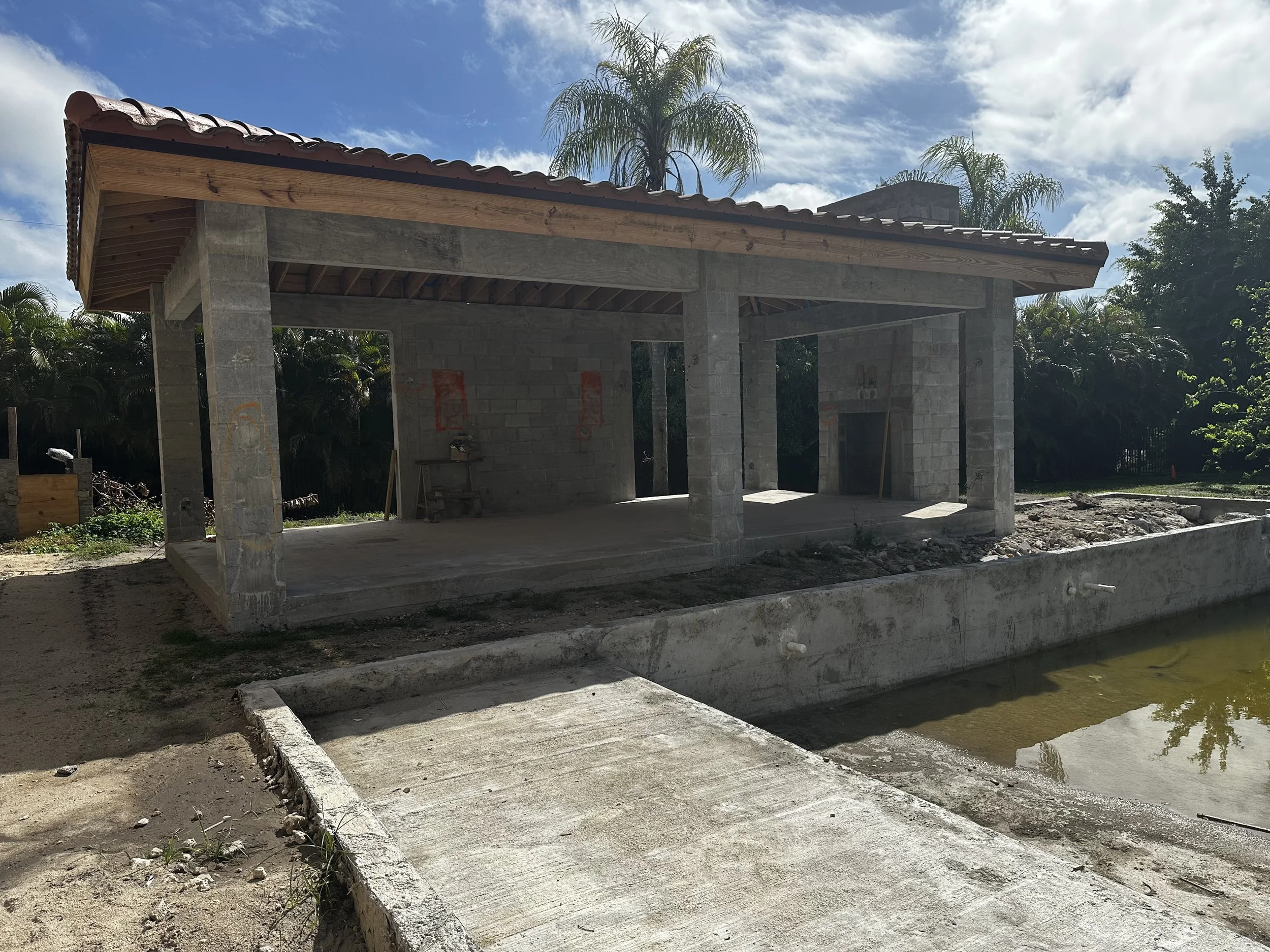 before picture of Mediterranean design-build stone gazebo in Boca Raton under construction with columns and tile roof