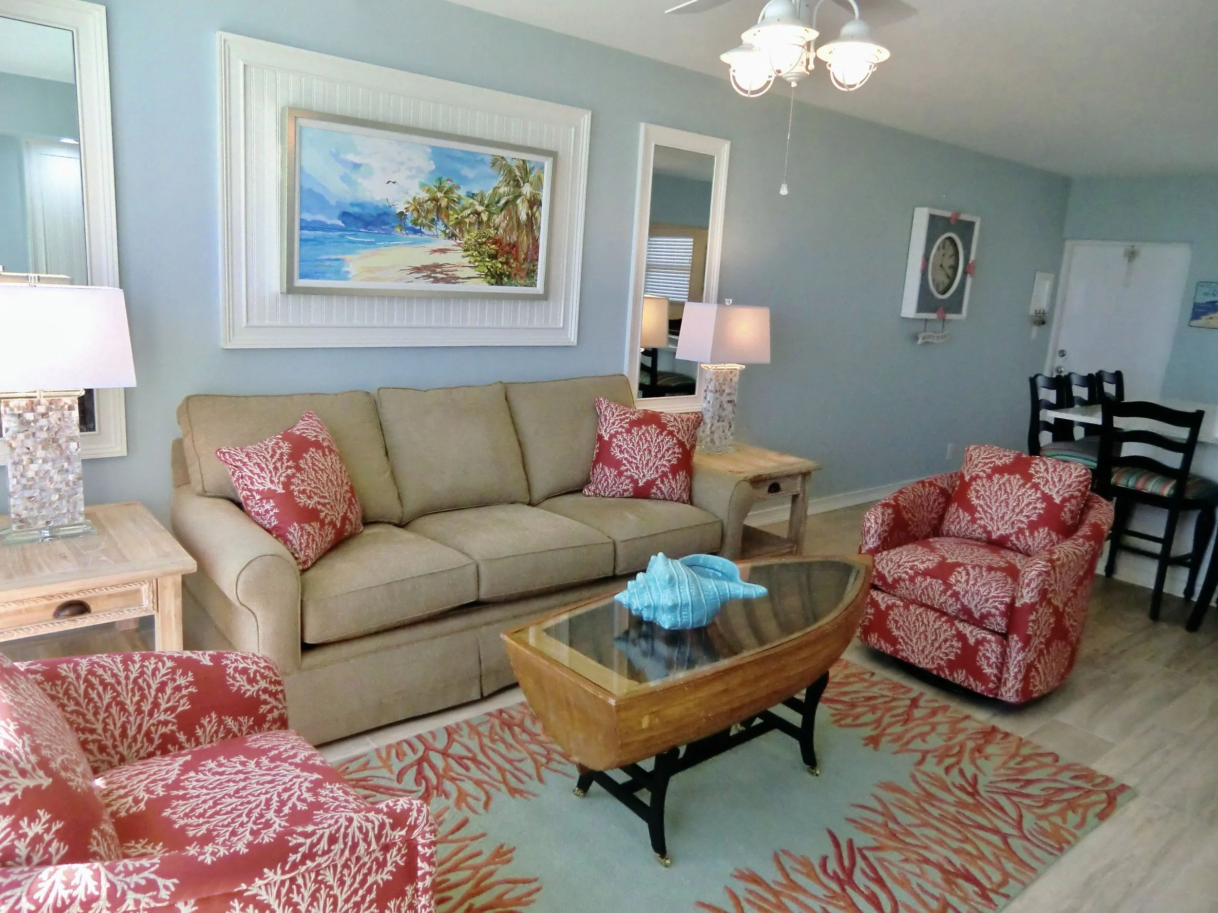 modern tropical  living room with coral and aqua in the Florida Keys