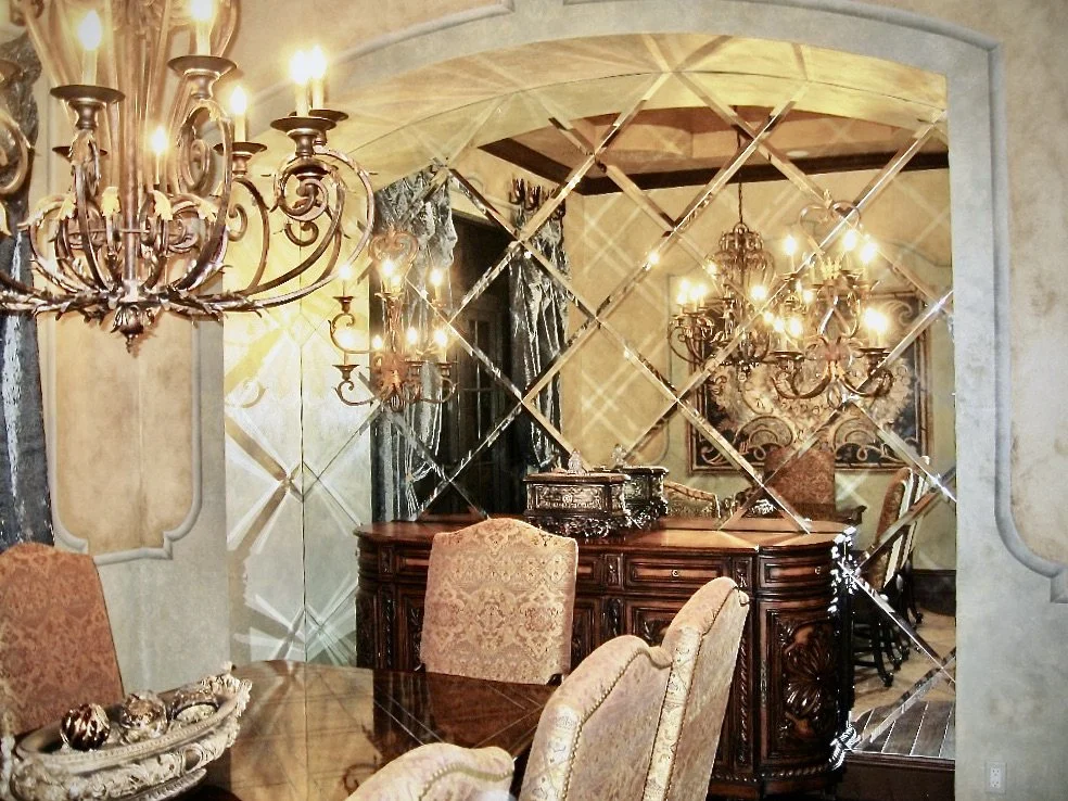 traditional mediterranean dining room mirrors gold chandelier