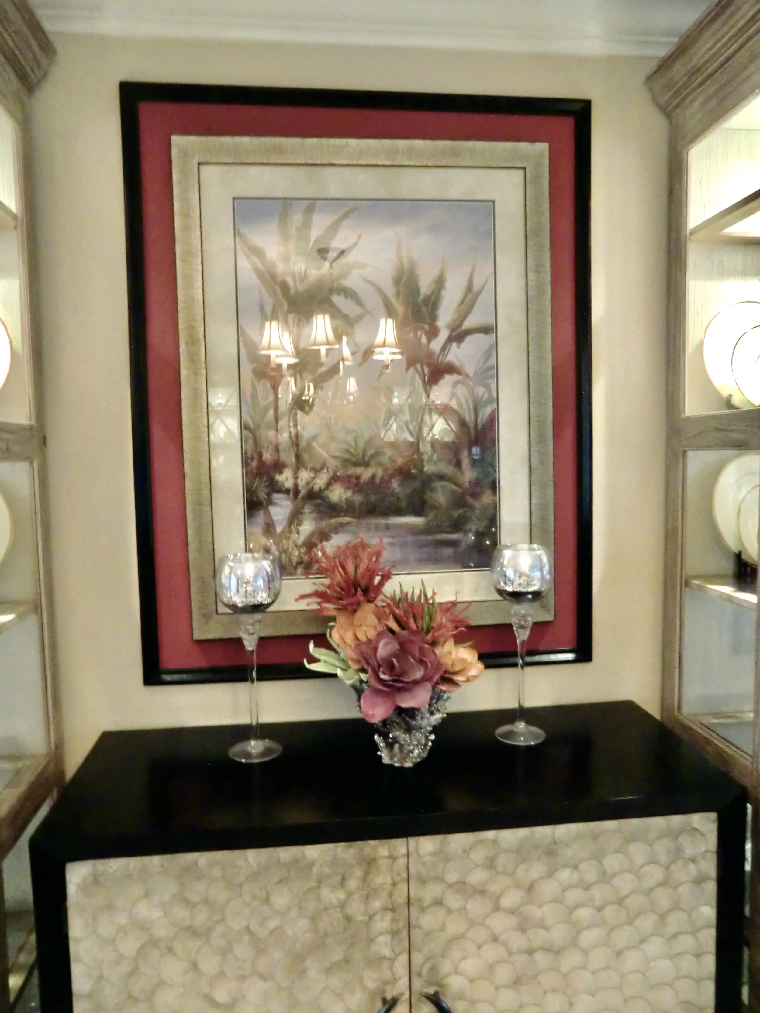 coastal tropical Florida artwork over a shell breakfront in Delray Beach
