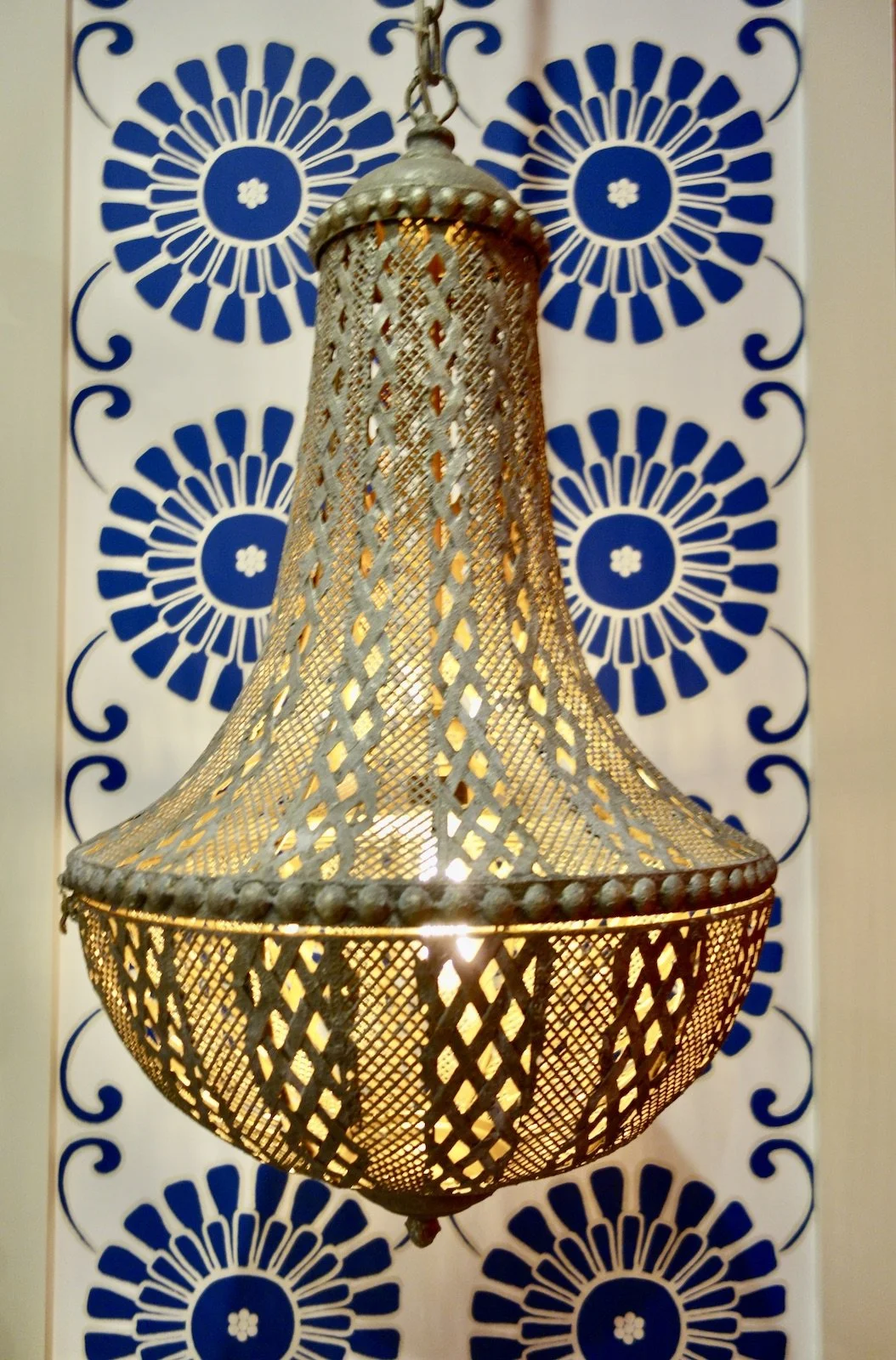 silver rustic hanging light with Batik fabric on Las Olas Blvd.