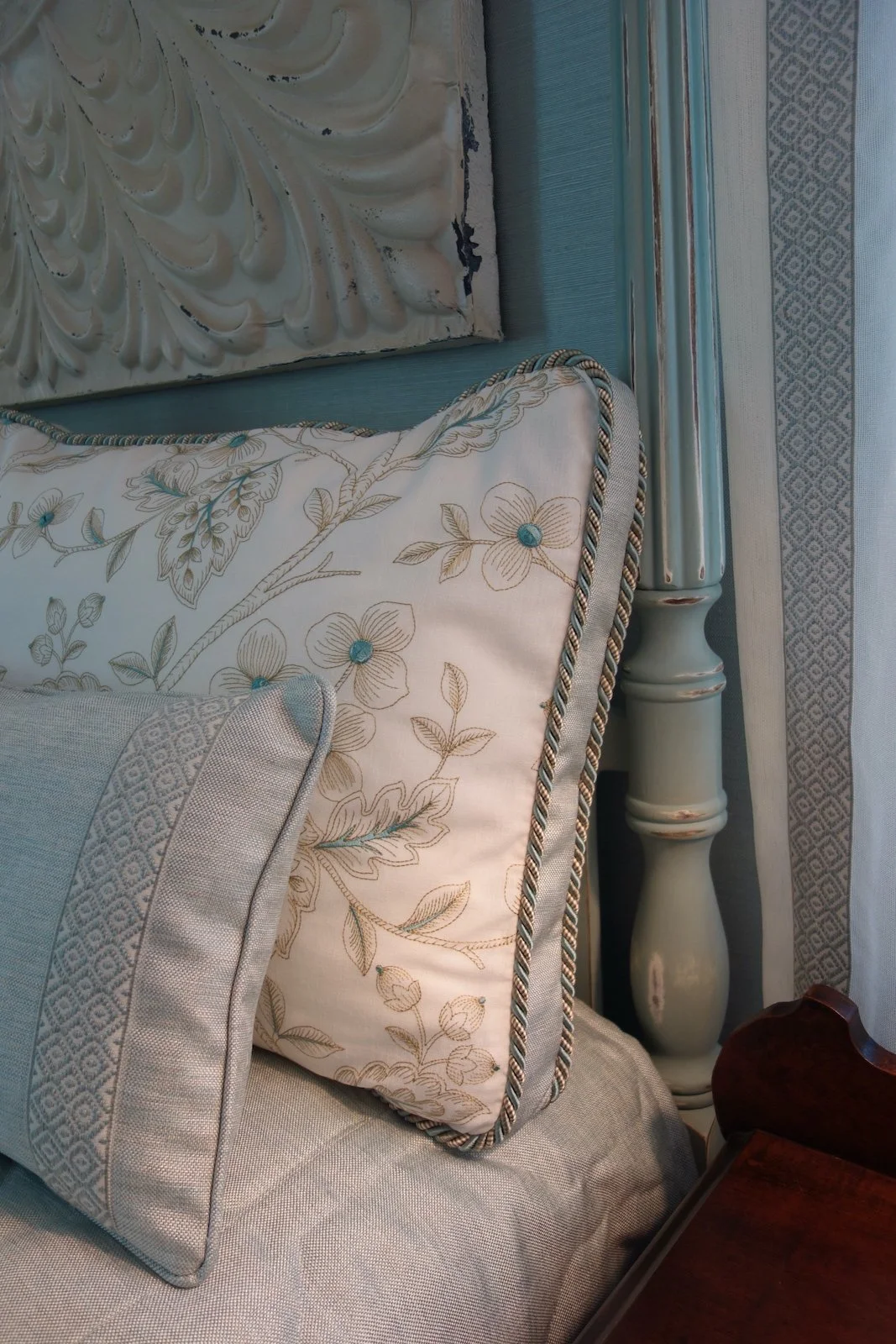 coastal style bedroom in aqua with four poster bed and custom bedding and drapery in Fort Lauderdale