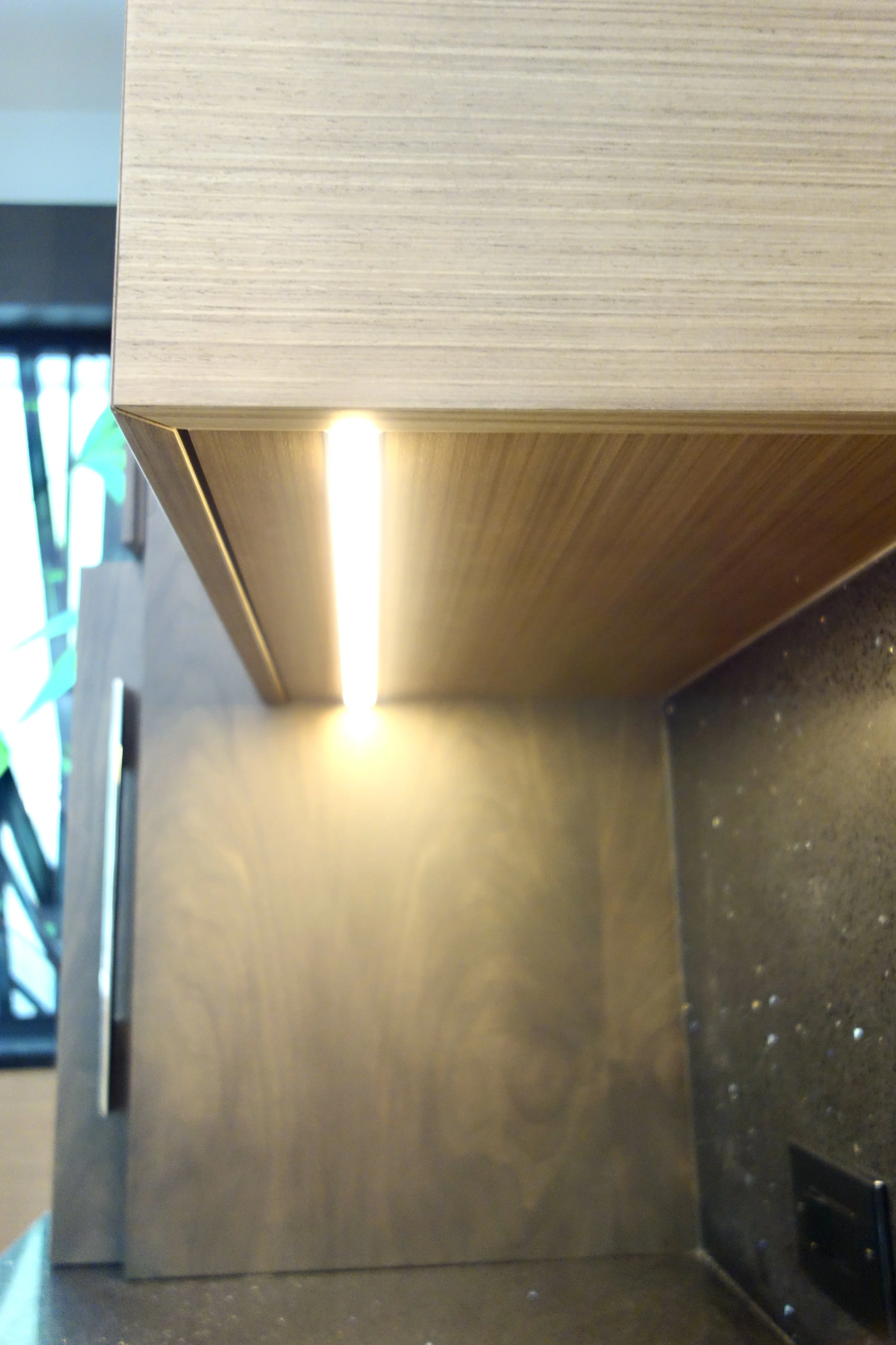 modern custom cabinetry with under cabinet lighting