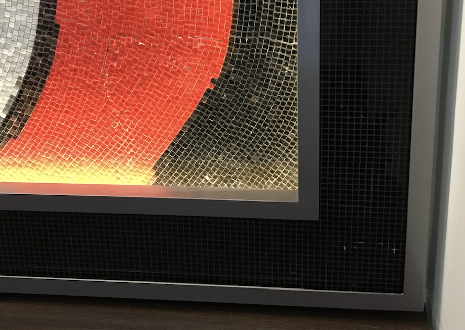 modern glass mosaic mural of a Picasso Lady in Red chair