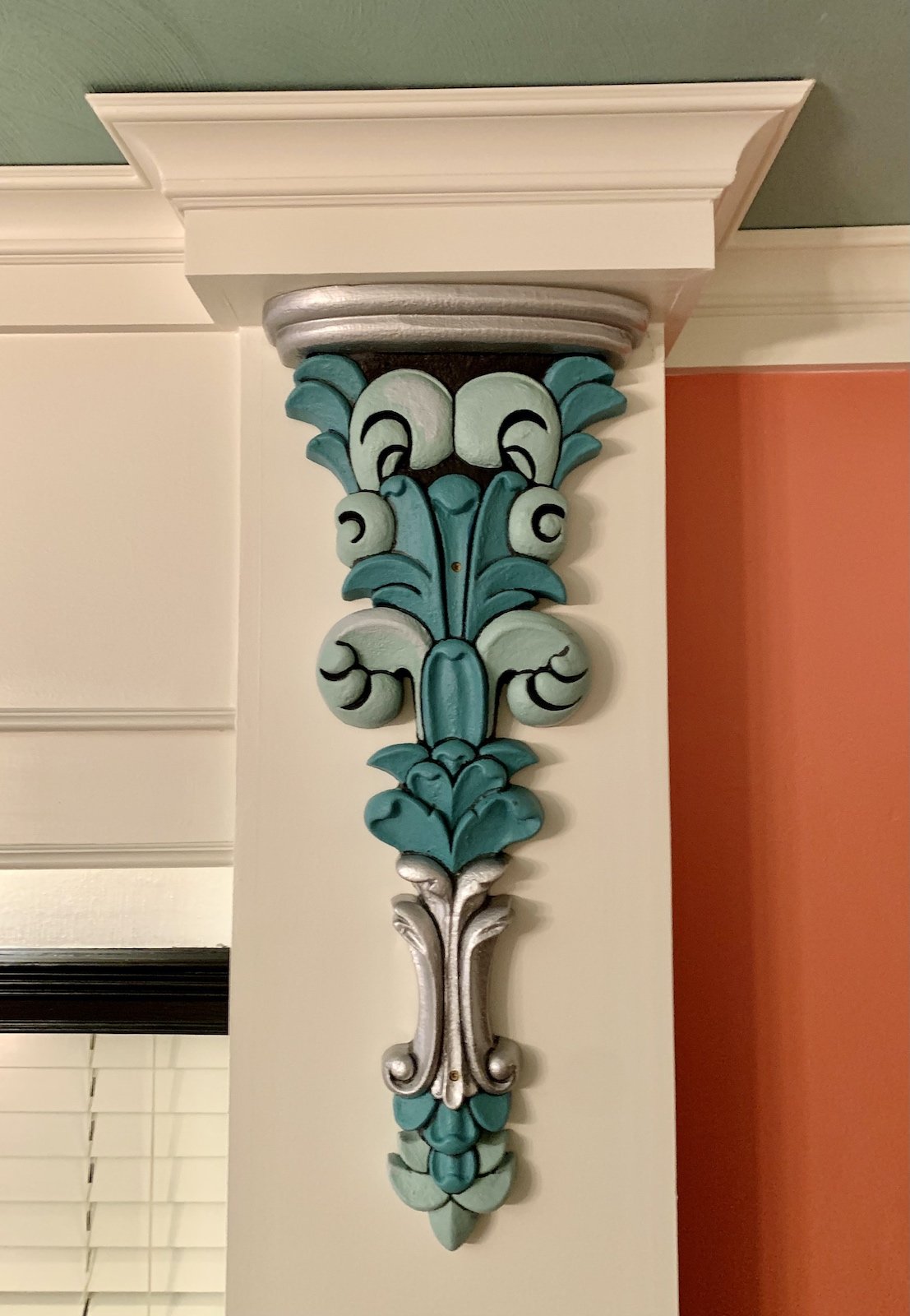 mediterranean architecture with colorful corbels on columns