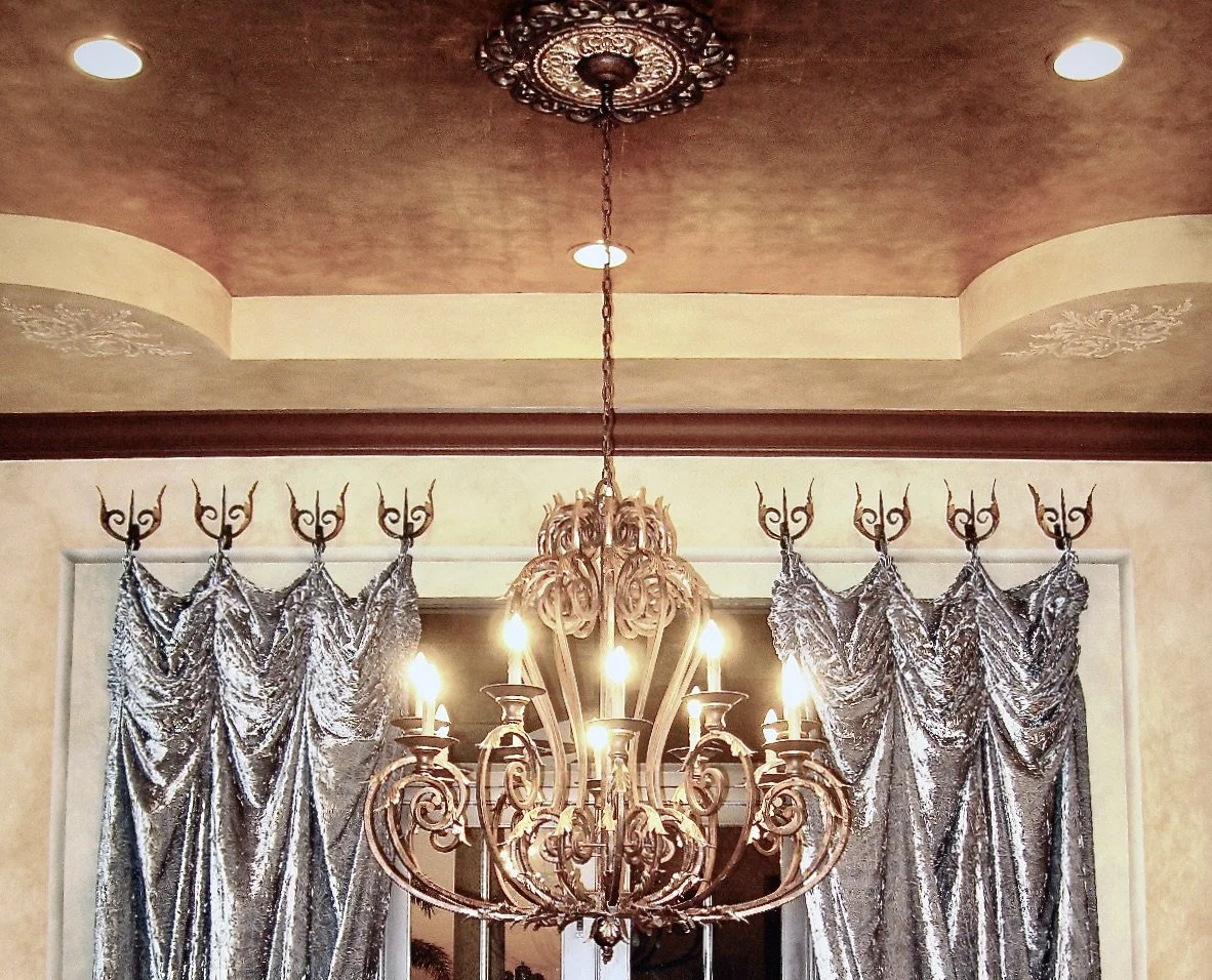 Mediterranean home remodel with chandelier and custom draperies in Weston