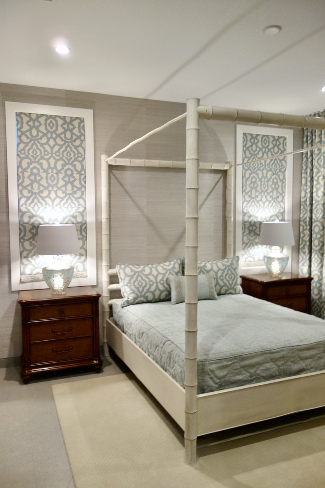 tropical bedroom in aqua and tan with four poster bed in Fort Lauderdale