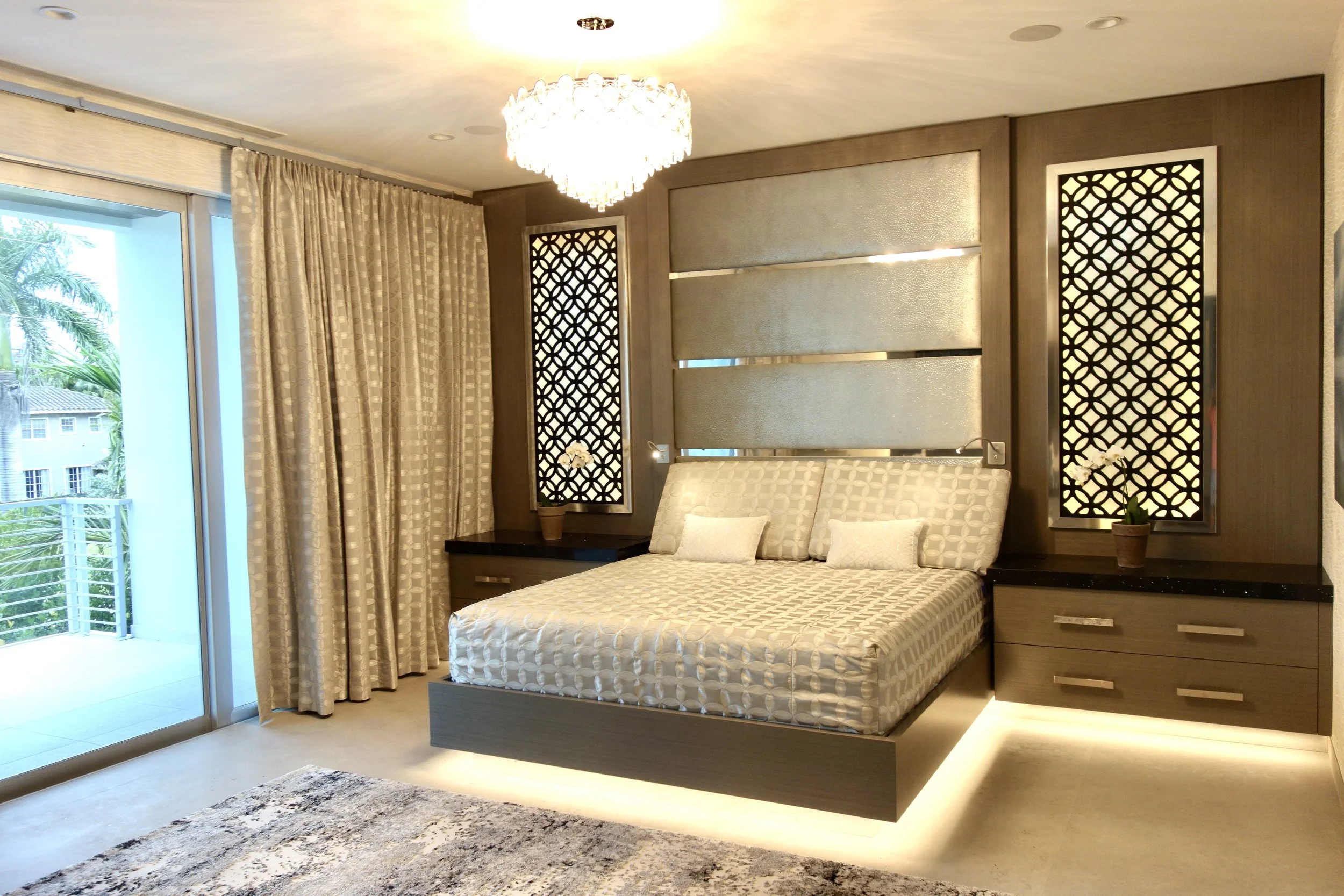 luxury modern primary master bedroom with custom cabinets