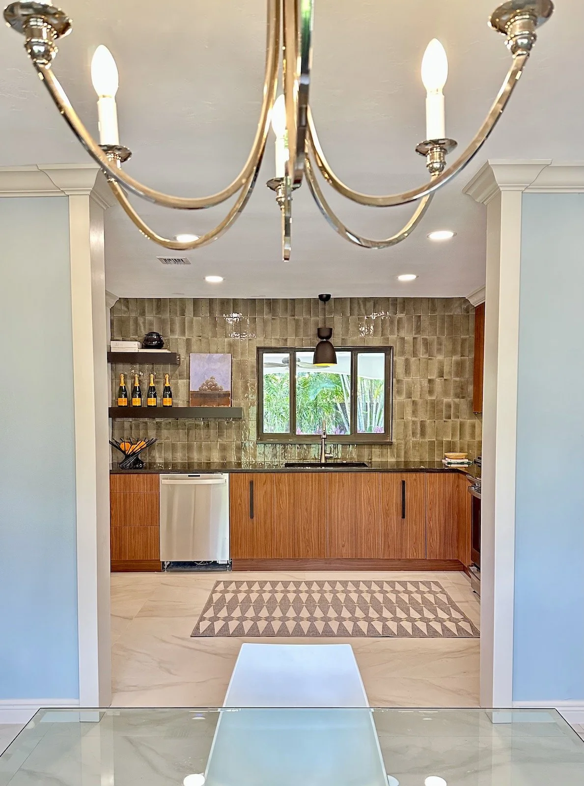 Modern Mid Century kitchen entrance with traditional moldings in Fort Lauderdale