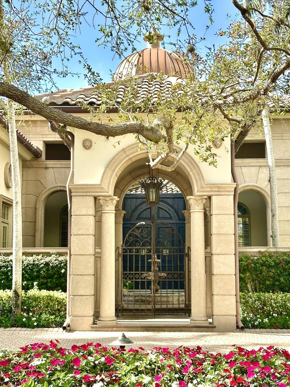 entrance to homes courtyard with stone columns in Mediterranean architecture