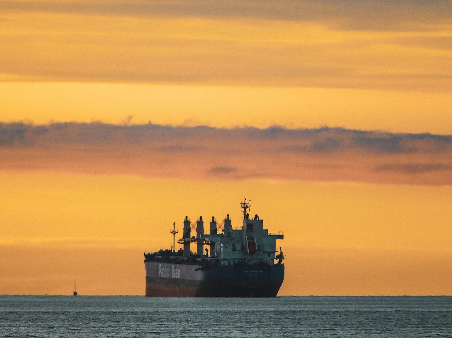 Empty oil tanker waiting to be able to pass through the Strait of Hormuz