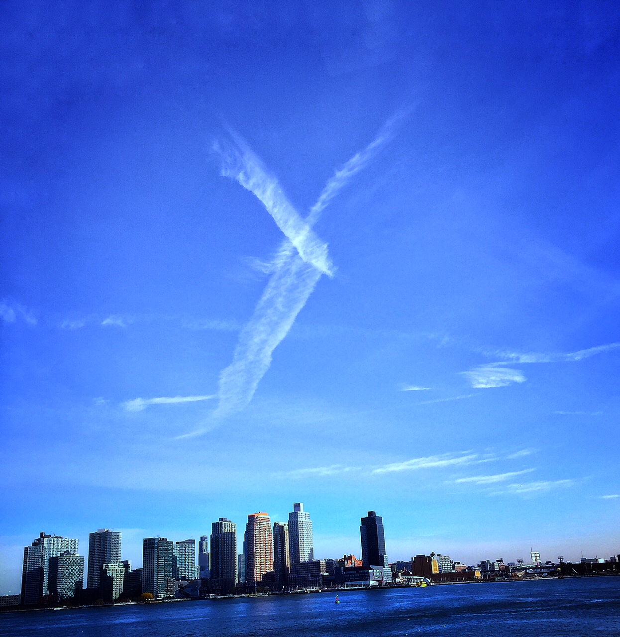 I saw this wishbone cloud on December 15th, 2016 while driving along the East River in New York.