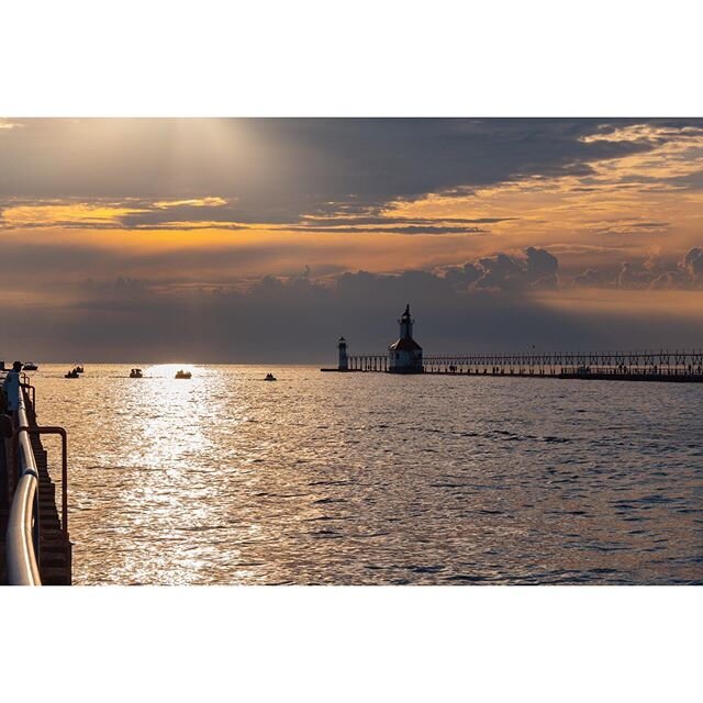 Spending some time today remembering then and there.
.
.
.
.
.
.
.
#skyonfire #raw_skies #lighthouse #silhouette #goldenhour #pierwalking #puzzleworthy #visualappeal #infiniteperspective #boatsonthehorizon #mothernature 
#lakemichigan #stjosephmichig