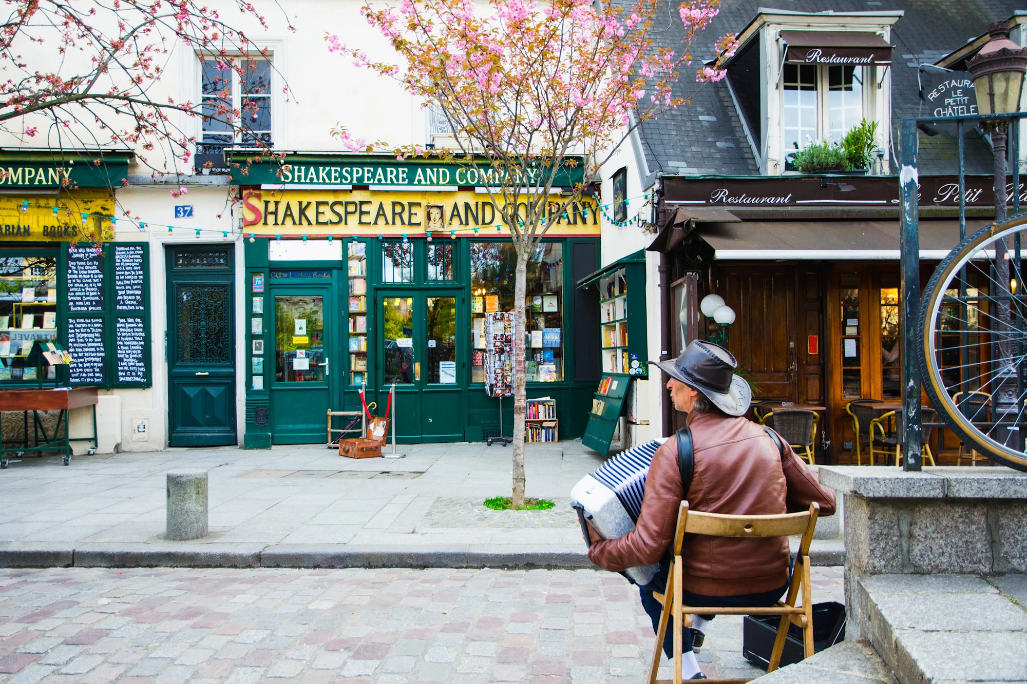 Kelly Sandos Shakespeare and Company Book Shop Paris, France street musician