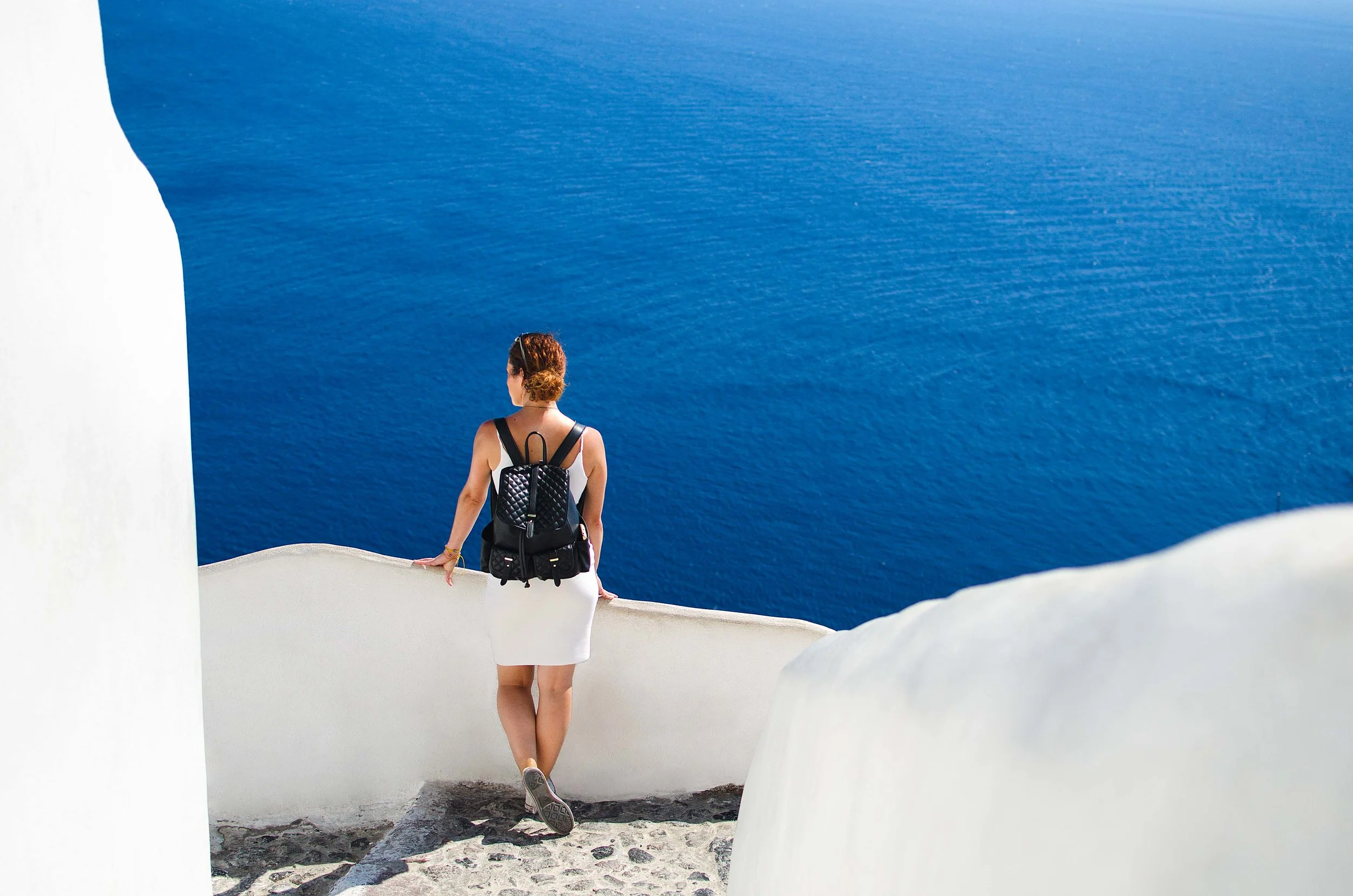 Kelly Sandos white and blue Santorini sea