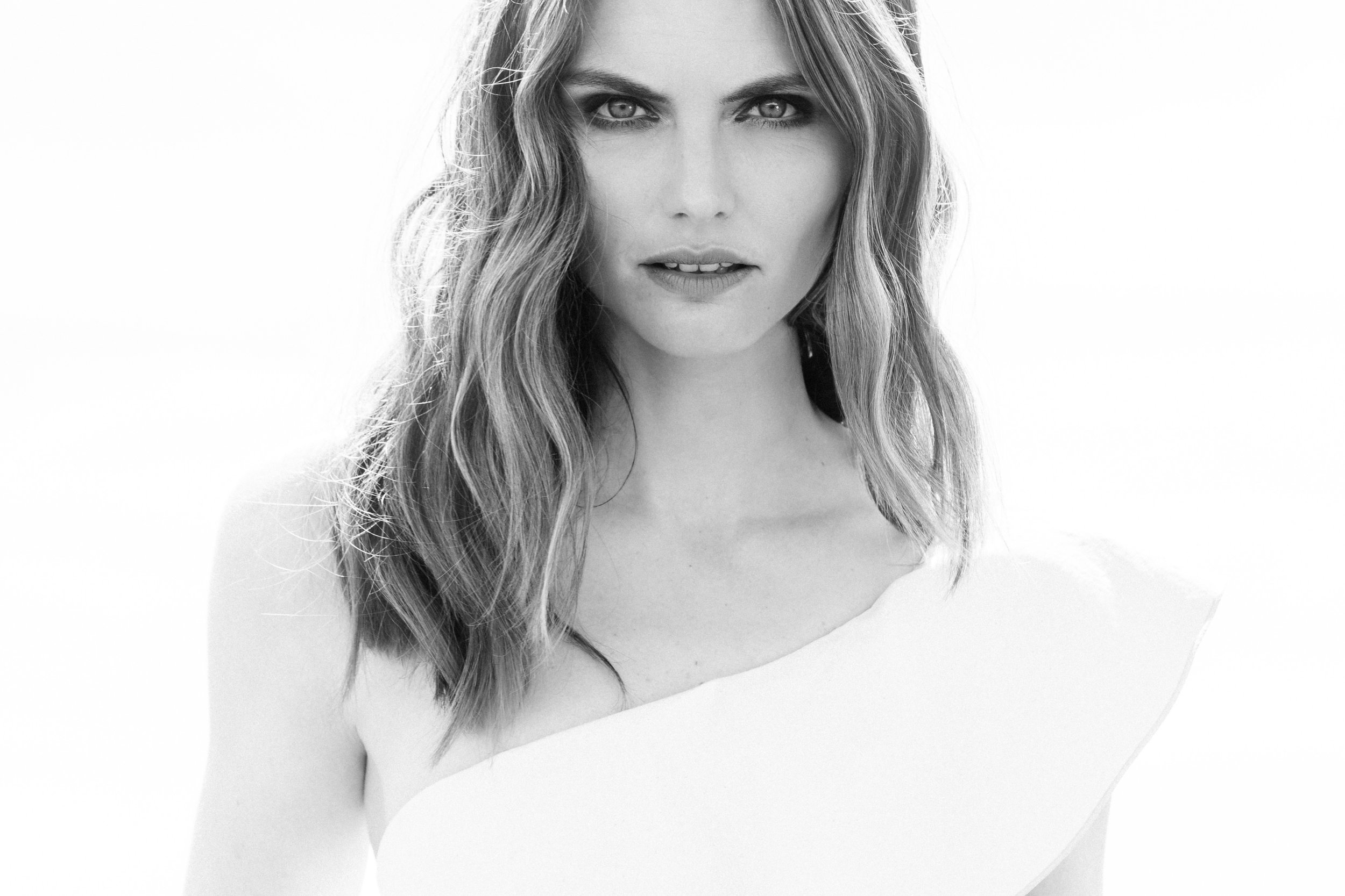 Black and white portrait of model Kristy McQuade. 