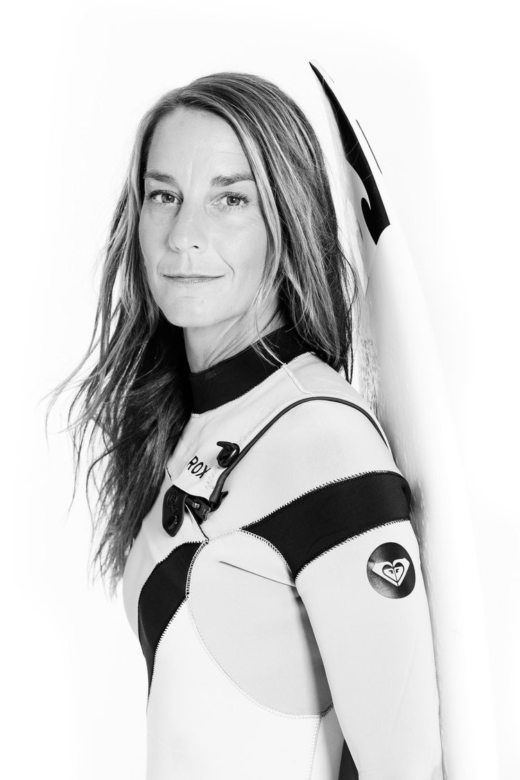 A studio portrait of Tofino surfer Catherine Bruhwiler. 