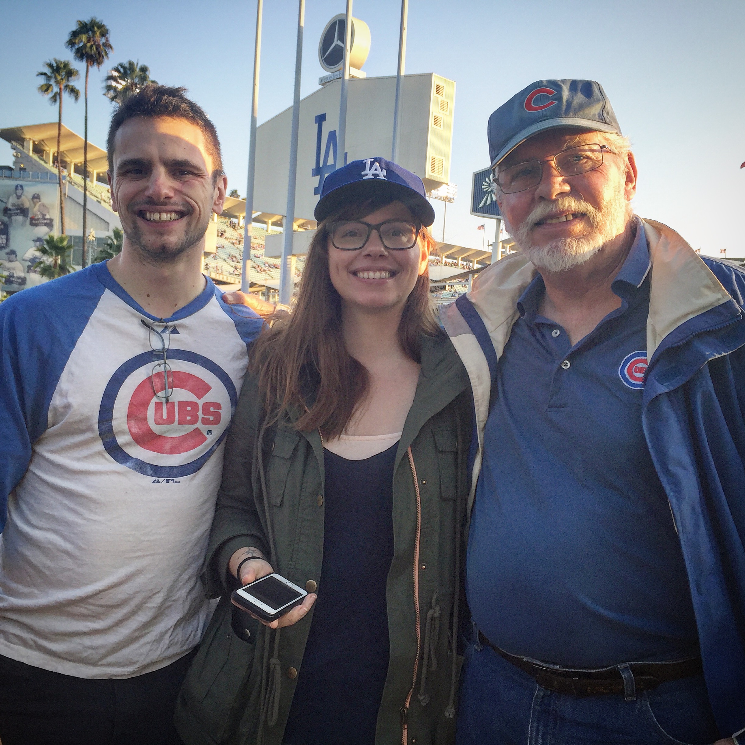 The Manis's rooting for the Cubs at Dodger Stadium.