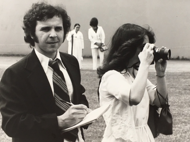  On the media beat (and in need of a haircut) at the University of Lowell Commencement, now UMass Lowell, at Cawley Stadium with Leslie Kaplan, 1979. 