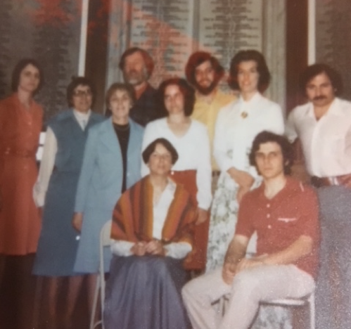 Members of the Poets’ Lab gathered for a group reading at Memorial Hall Library, Andover, Mass., 1977. Back row, from left, Kathleen Aponick, Alice Davis, Stephen Perrin, Charles Brunault, Mary Tremblay, Wayne Nalbandian; middle row, Florence Liberfarb, Anne Fleming; Seated, Cynthia Ward, PM.