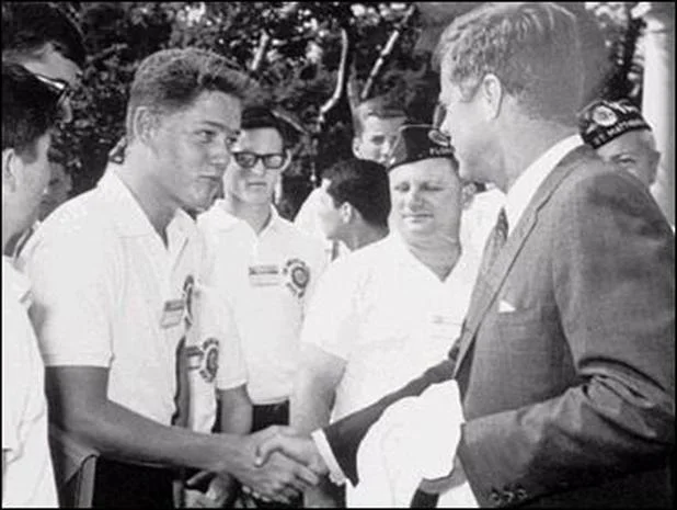 Young Bill Clinton meets President John F. Kennedy during his Boys Nation visit to Washington, D. C., in 1963 (Web image courtesy of cbsnews.com)