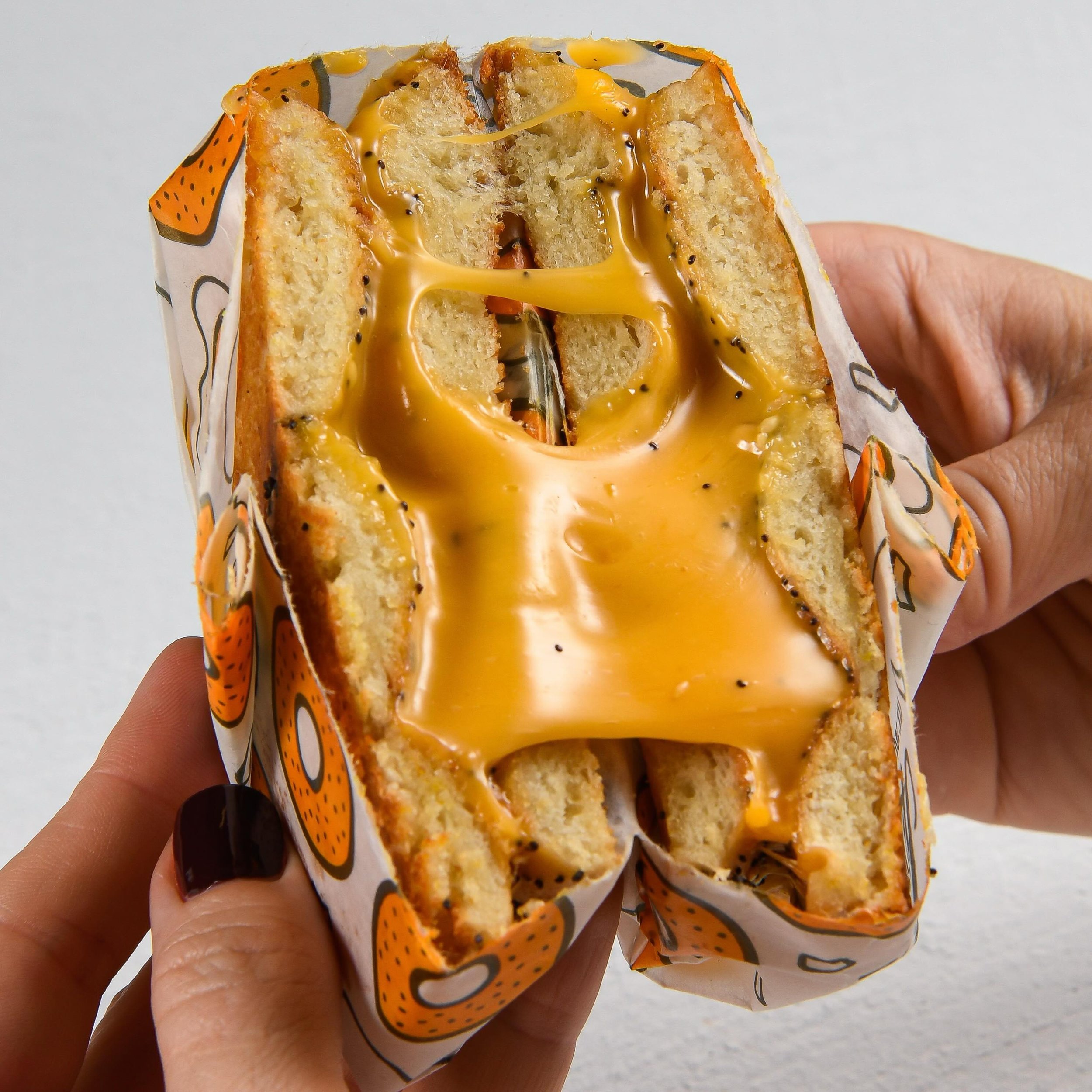 SAY CHEESE! Now through National Grilled Cheese day (April 12th - mark your calendar), @blackseedbagels is serving grilled cheese sandwiches on an inside-out bagel, using @eatnewschool American cheese and it&rsquo;s DELICIOUS. The crispy edges&hellip