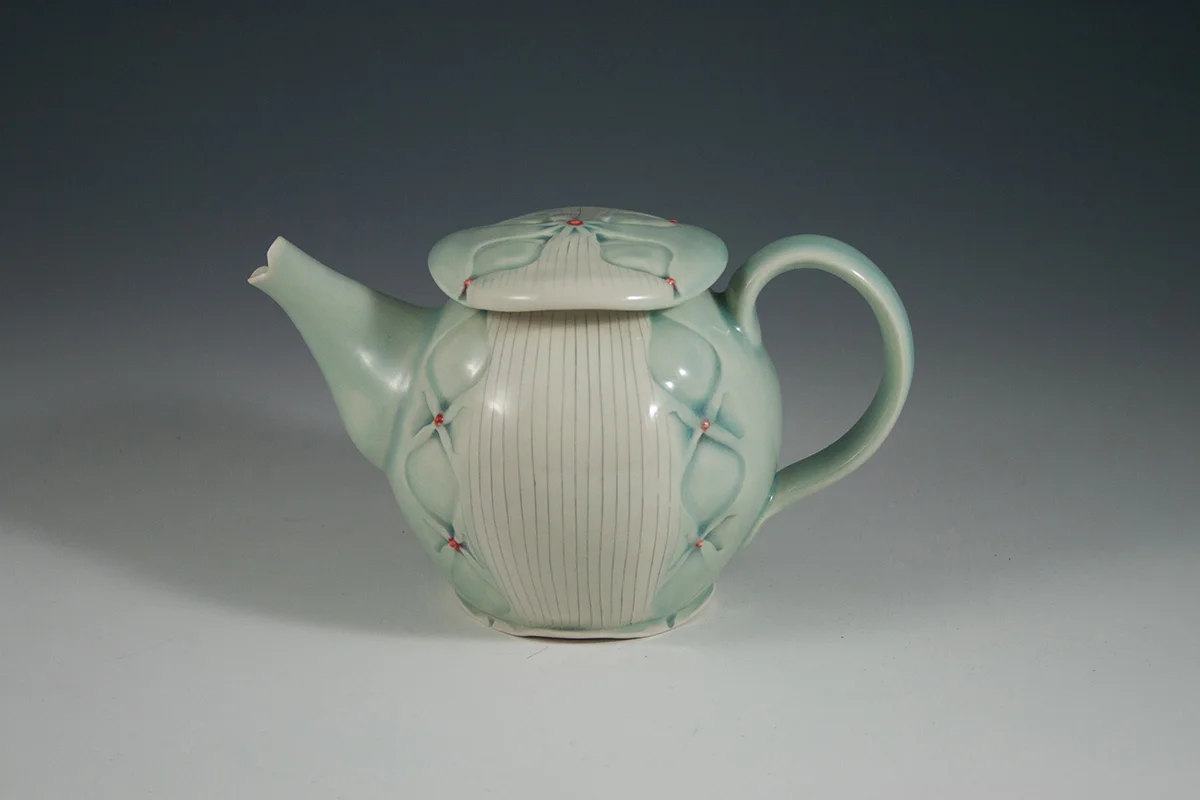 Teapot 2016, Stamped and inlaid porcelain, cone 6 electric