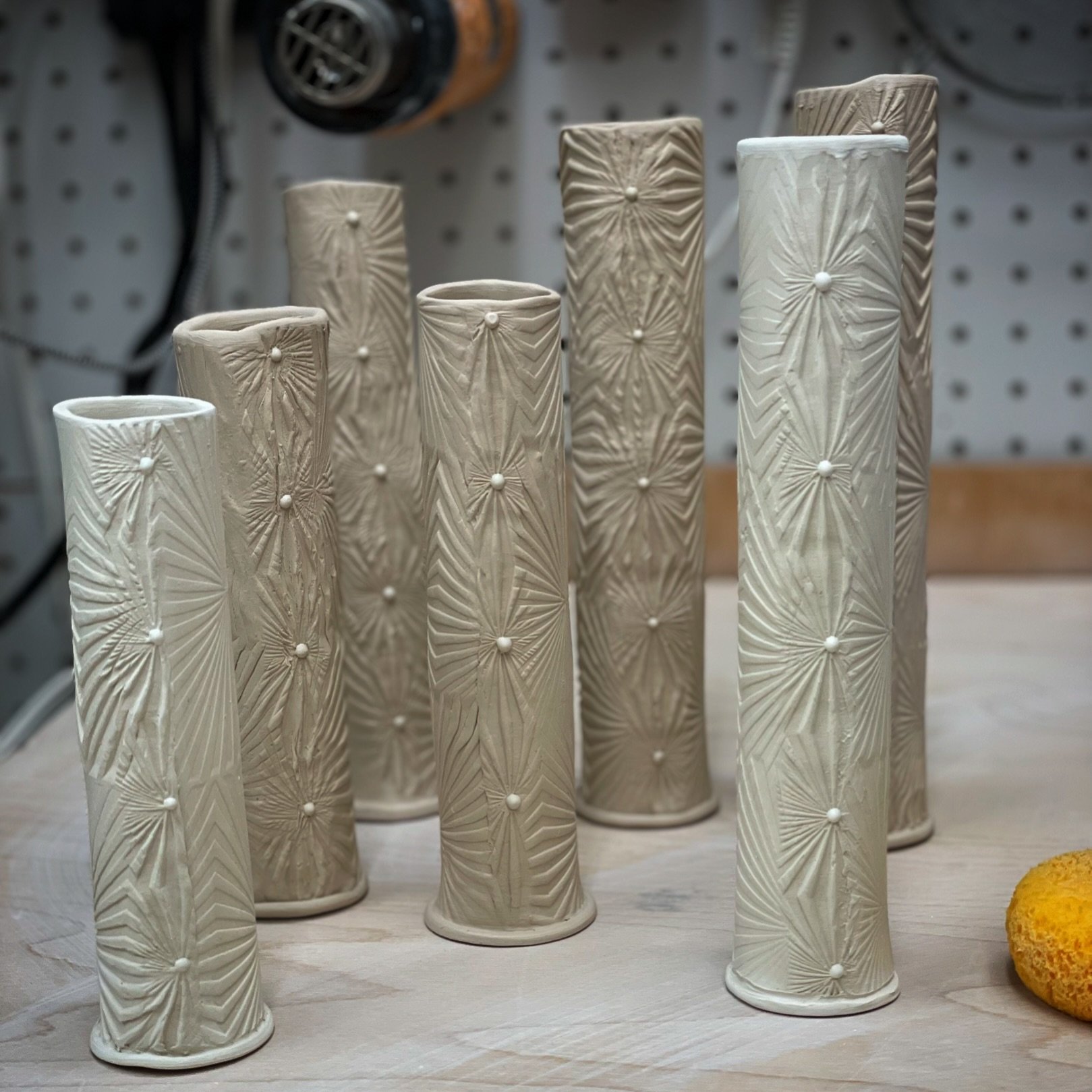 Don&rsquo;t worry 😉, I remade some! They are slowly drying under a layer of plastic and behind my thick plastic sheeting shelves. Also, it&rsquo;s warmer out now. 🤞🏻
.
#redux #redo #doover #budvases #ceramics #handbuiltpottery #porcelain #pattern