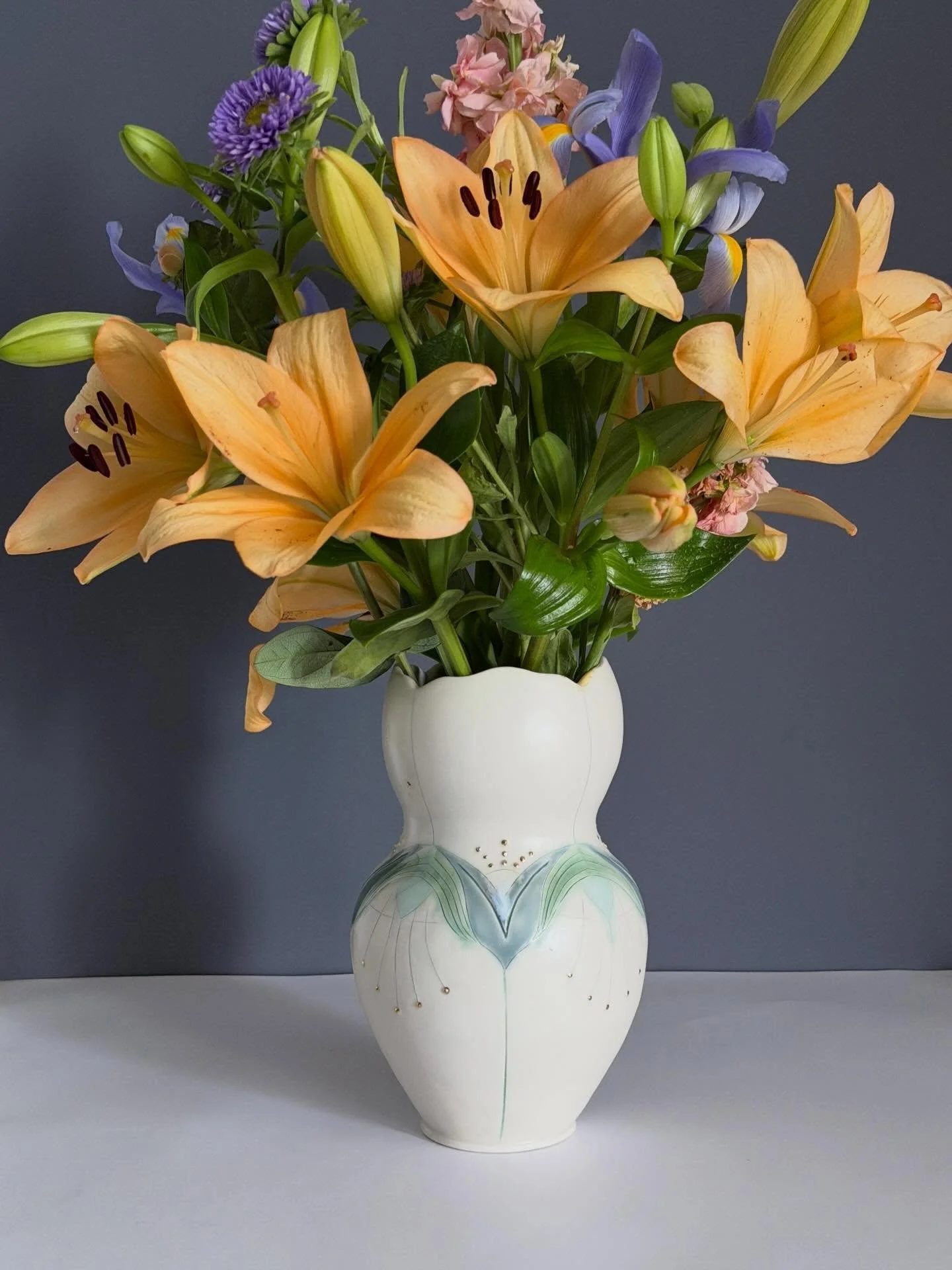 Really thrilled with how this porcelain vase turned out. It was a demo pot that sat in my damp box for months because I just couldn&rsquo;t get to it. Several making cycles had passed and I finally got her decorated fired and glazed. Coincidentally, 