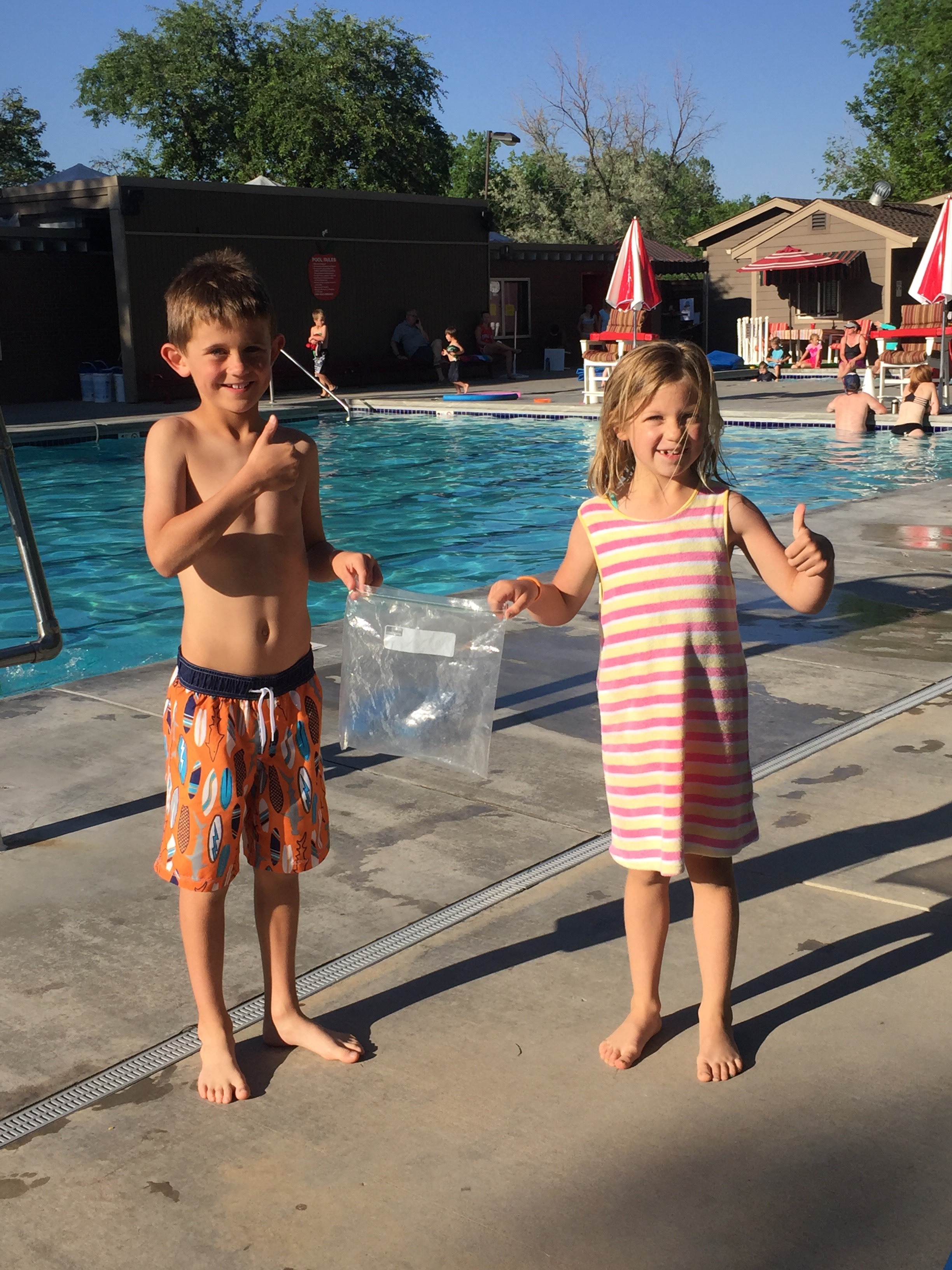 Local children performed acts of kindness at a pool