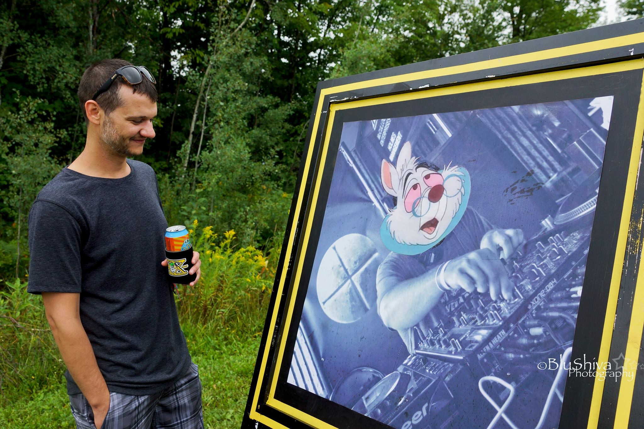 Ryan Motta with his one of his photos. Photo courtesy Shannon Crabtree.