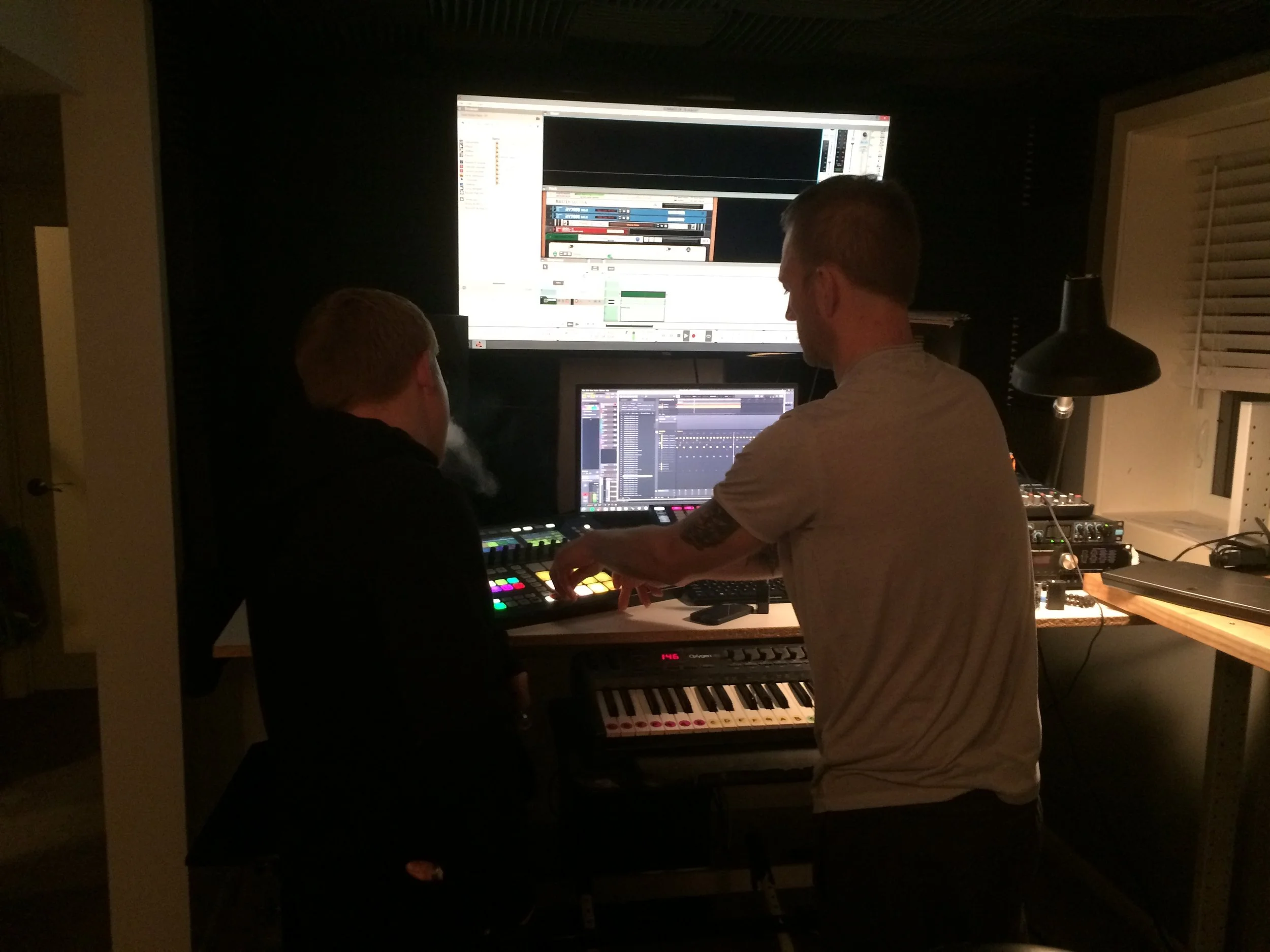 Loeding helps James with a work-in-progress track.