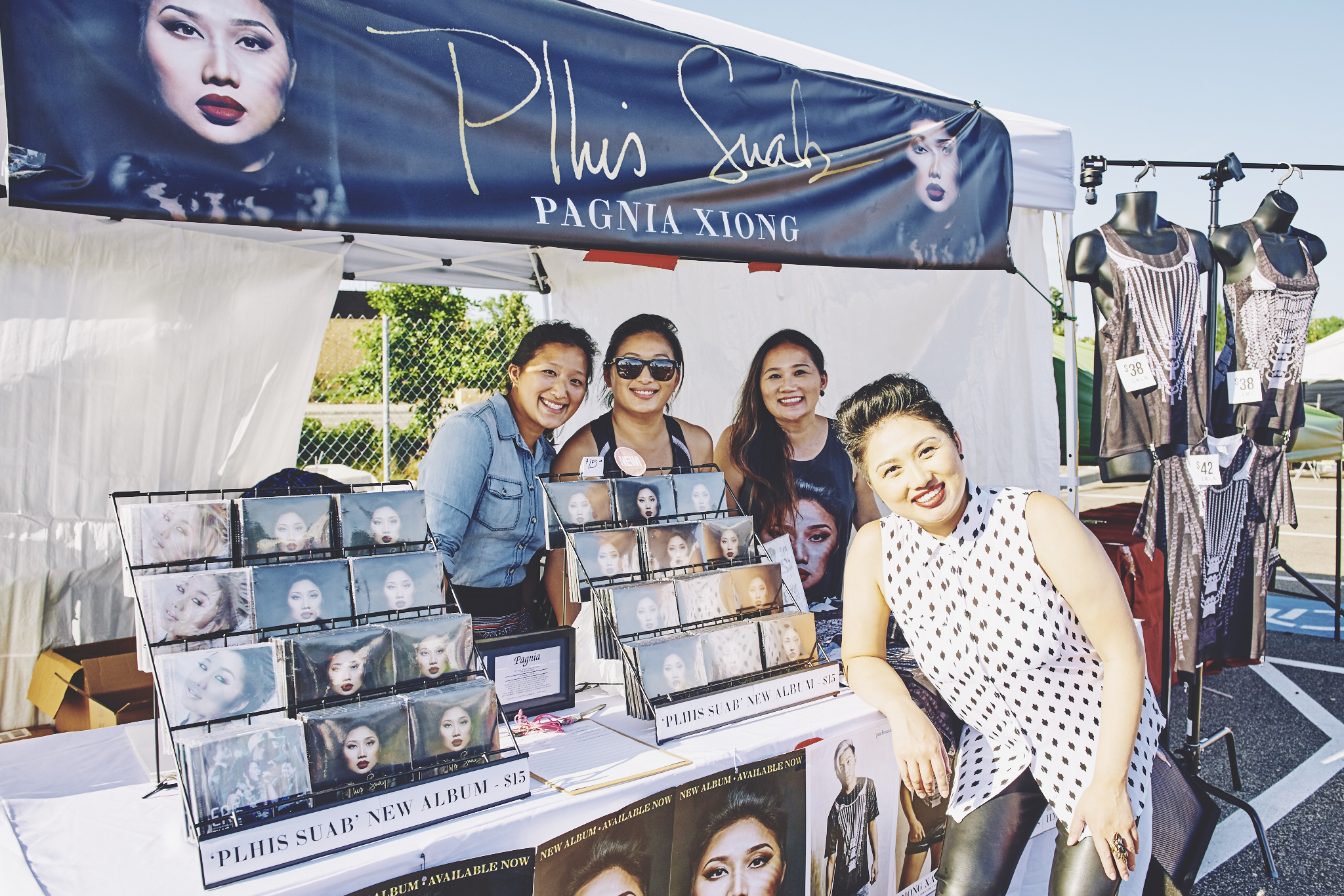 Plhis Suab booth with the sister crew.