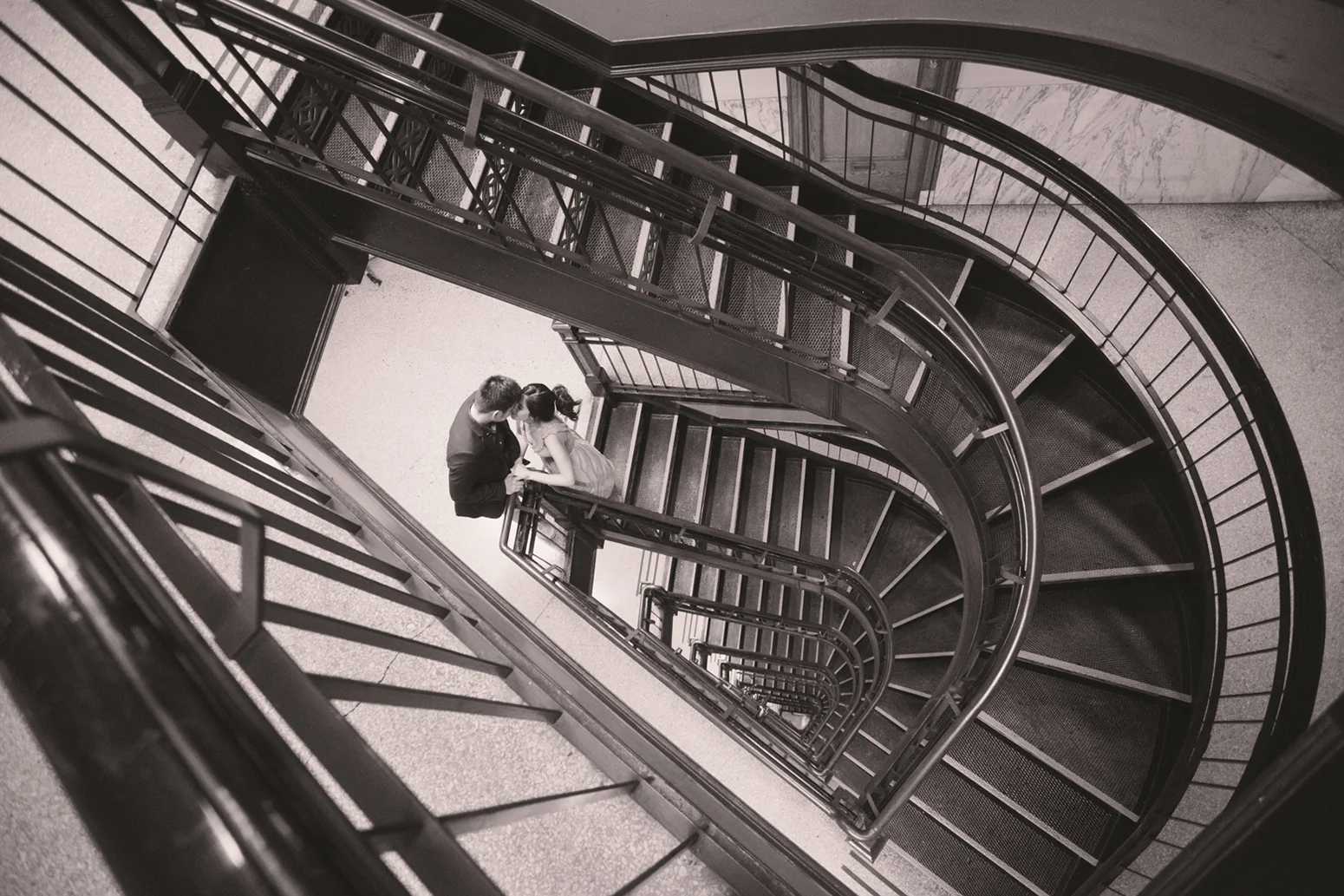 couple-engagement-session-on-a-flight-of-interesting-stairs-in-gastown-building-macy-yap-photography.jpg