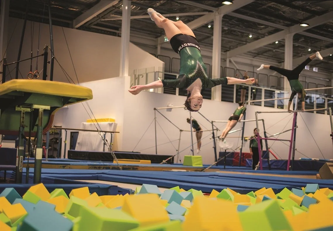 hub-gymnastics-gymnast-flipping-into-the-foam-pit.jpg