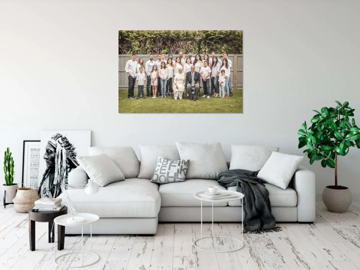 An appropriately sized wall portrait of a family of 25 (40”x60”).