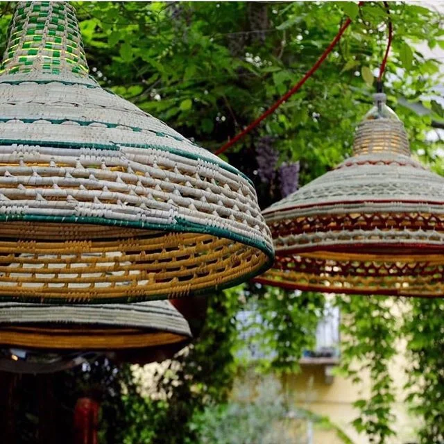 This is Mapuche, the most recent addition to the dazzling @petlamp family, released recently @rossana_orlandi during Milan Design Week.

PET Lamps are woven using recycled plastic PET bottles and traditional weaving techniques. Designer Alvaro Catalán de Ocón began the concept in 2011, concerned by the scale of waste caused by the bottles, and the plastic waste now pouring into our oceans as a result.

He worked with artisans in Columbia to make the first range of bright and cheery designs, often strung in playful groupings.

From Columbia to Ethiopia, the identity of each culture is woven into each piece. Such a shining example of how design and beauty can be used for good! 📸@petlamp 
Available in Australia @spenceandlyda

#weaving #woven #traditionalweaving #woven #wovenbasket #basketry #lamp #lampshade