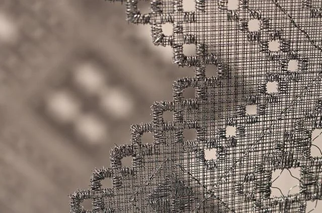 Wire embroidery, by Brisbane artist, Jeanette Stok.⠀
⠀
'Mutagenesis' was recently on display in the Artisan Ivory Street Window, created using Hardanger embroidery techniques.⠀
⠀
📷 Andrew Todd, via @artisanqld